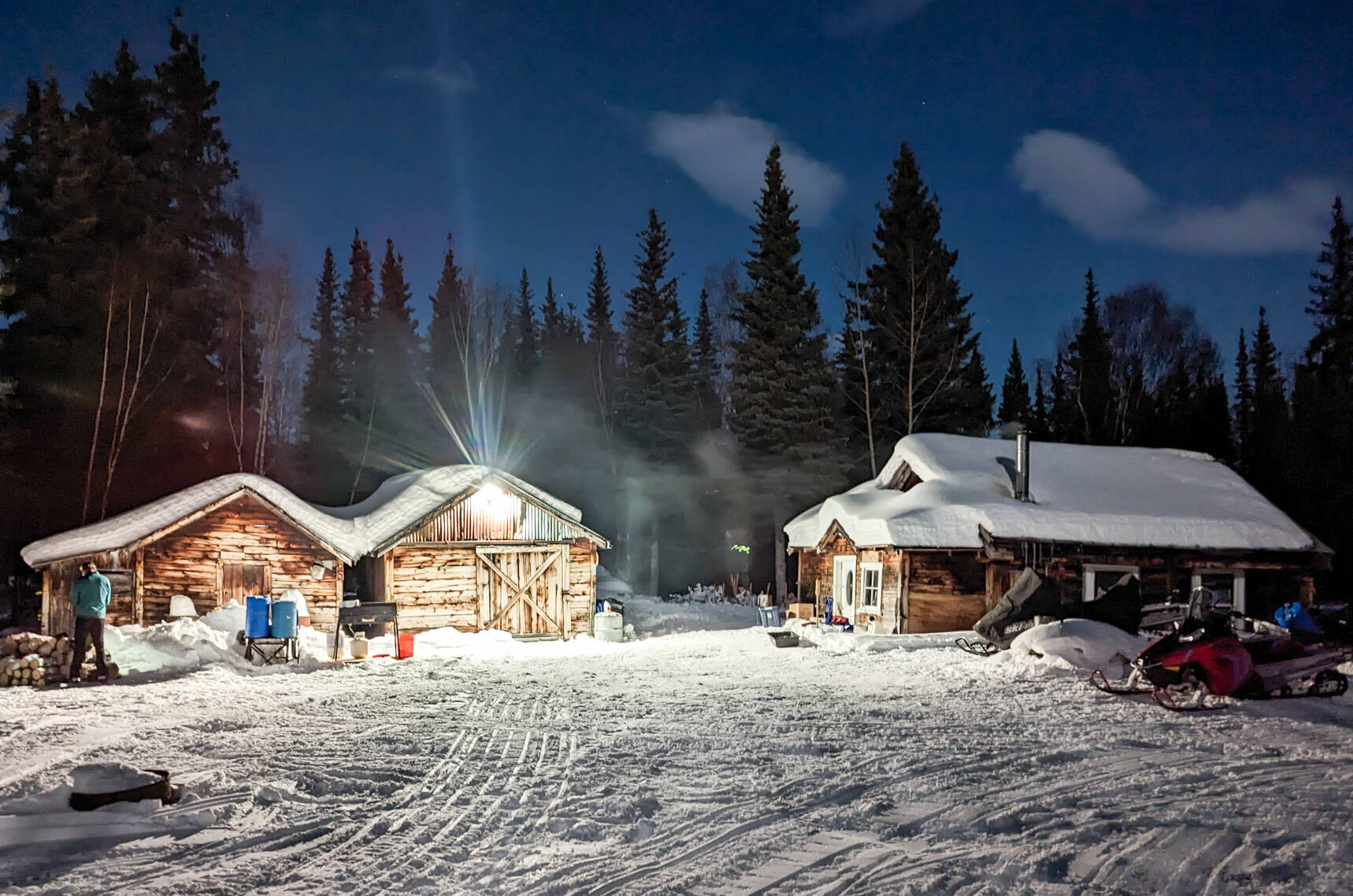 Iditarod checkpoint volunteers turned a light on in the ghost town of Ophir during the 2023 race. (Courtesy Photo / Jay Cable)