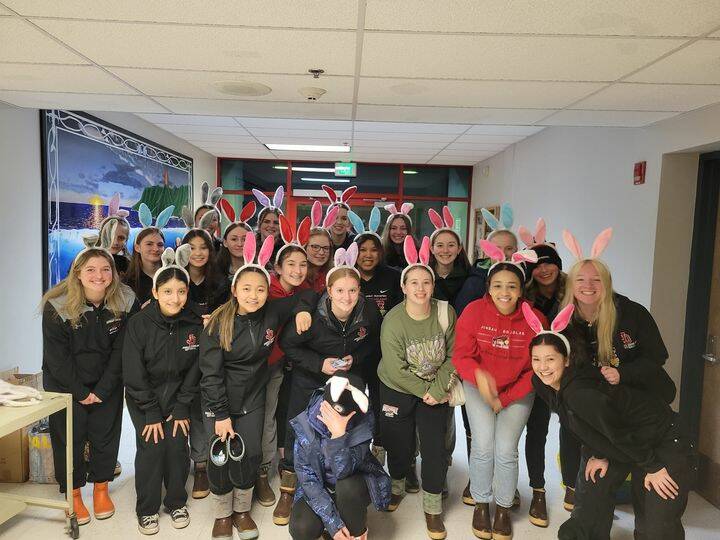 Courtesy Photo / Lexie Razor
The JDHS softball team poses for team photo on Saturday before delivering eggs to families across Juneau as part of the team’s third annual Egg My House event.