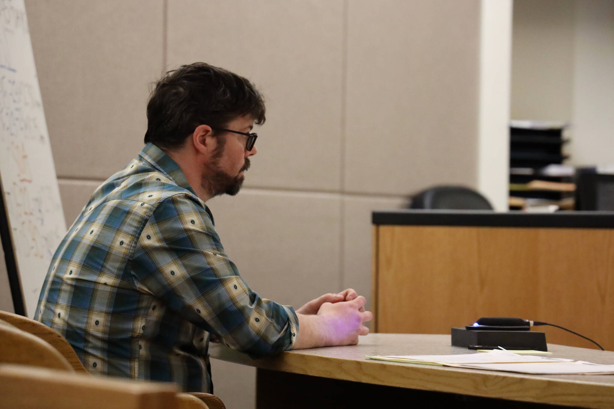 Mitchell Thomas Watley, 47, appears at the Juneau Courthouse late Tuesday afternoon. Watley is being charged with one count of felony terroristic threatening and faces up to five years in prison and a $50,000 fine for reportedly posting transphobic notes that referenced shooting children at three public locations in Juneau. (Clarise Larson / Juneau Empire)