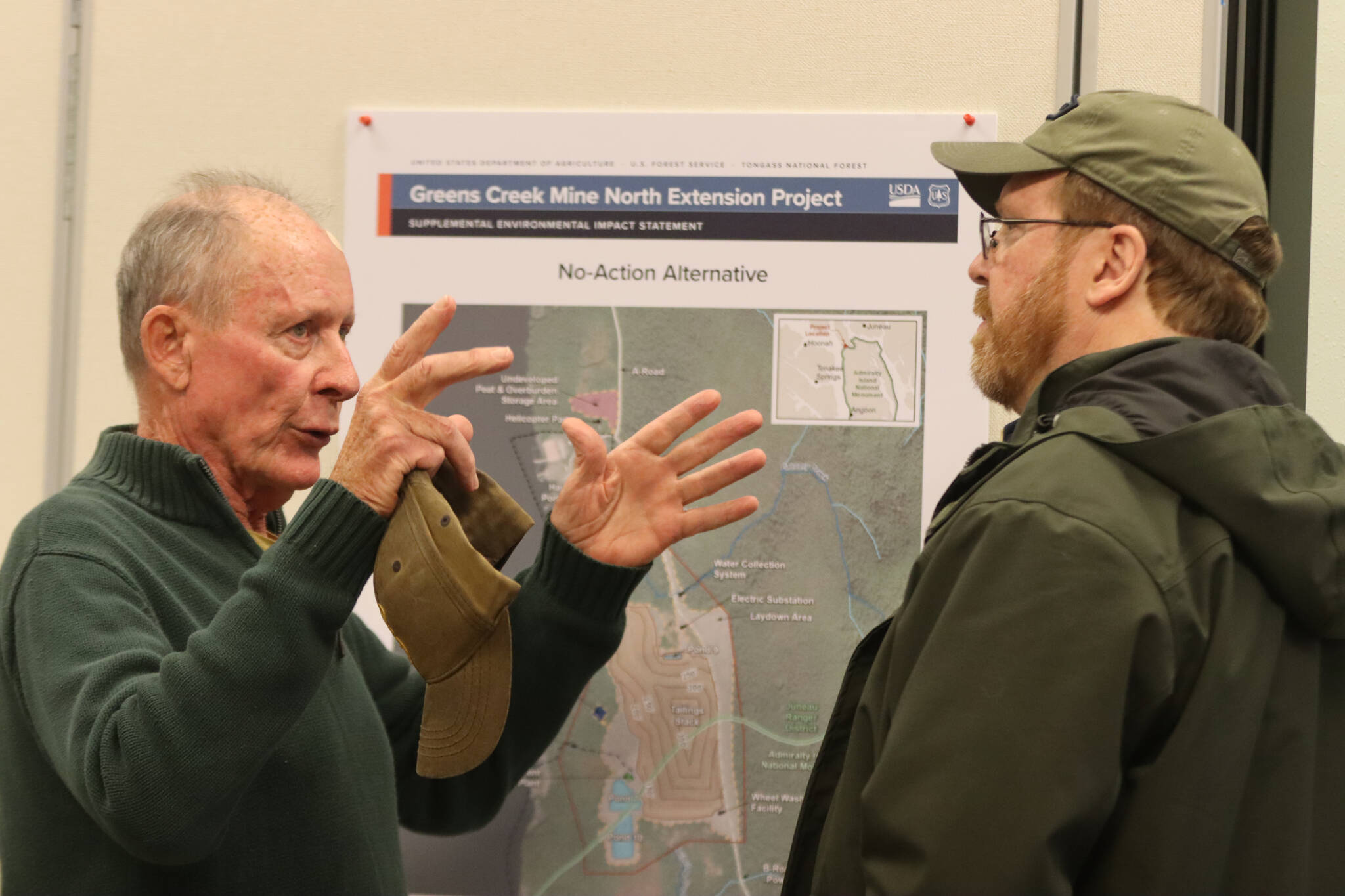Chief civil engineer with Greens Creek Mine David Landes answers questions from the public regarding the proposed North Extension Project at Hecla Greens Creek Mine on Wednesday during an open house at the Juneau Ranger District. (Jonson Kuhn / Juneau Empire)