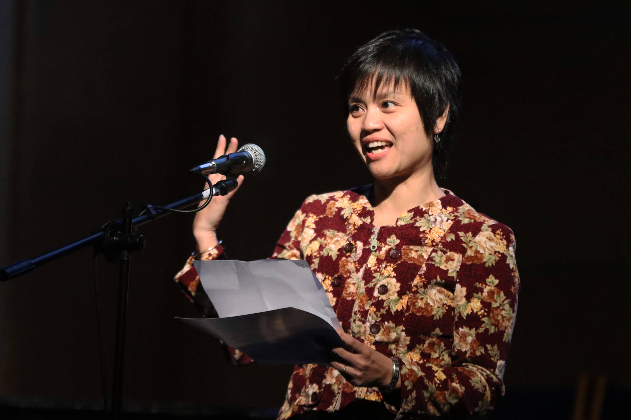 UAS assistant professor Nguyet Nguyen delivers a heartbreaking story from her childhood as part of Mudrooms closing event for the season on Tuesday night at Ḵunéix̱ Hídi Northern Light United Church. (Jonson Kuhn / Juneau Empire)