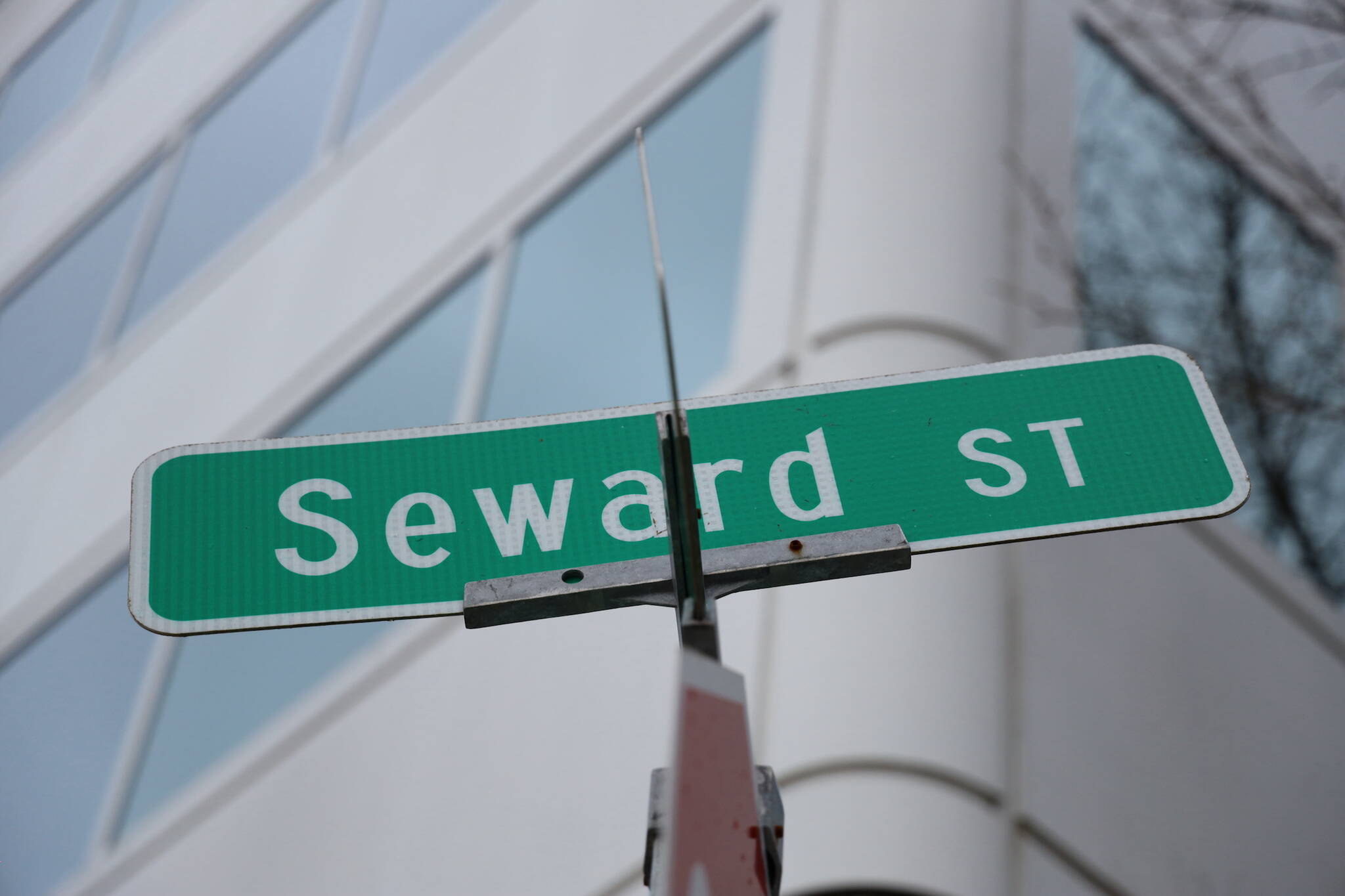 The Seward Street sign sits in front of the Sealaska Corporation near the downtown cruise ship docks. The street could have its name changed to ‘Heritage Way’ in the near future, according to City and Borough of Juneau City Manager Rorie Watt. (Clarise Larson / Juneau Empire)
