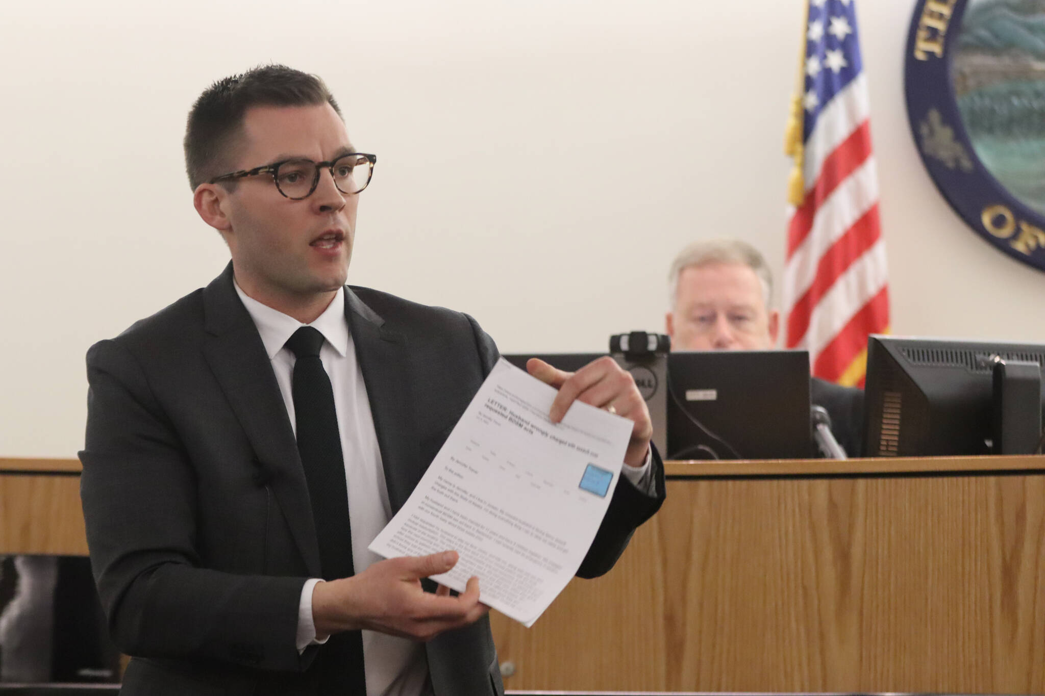 Defense attorney reads Jennifer Traver’s letter to the editor published by the Anchorage Press in where she defends her husband Jason Traver’s innocence for the felony assault charges he’s faced since 2019. (Jonson Kuhn / Juneau Empire)