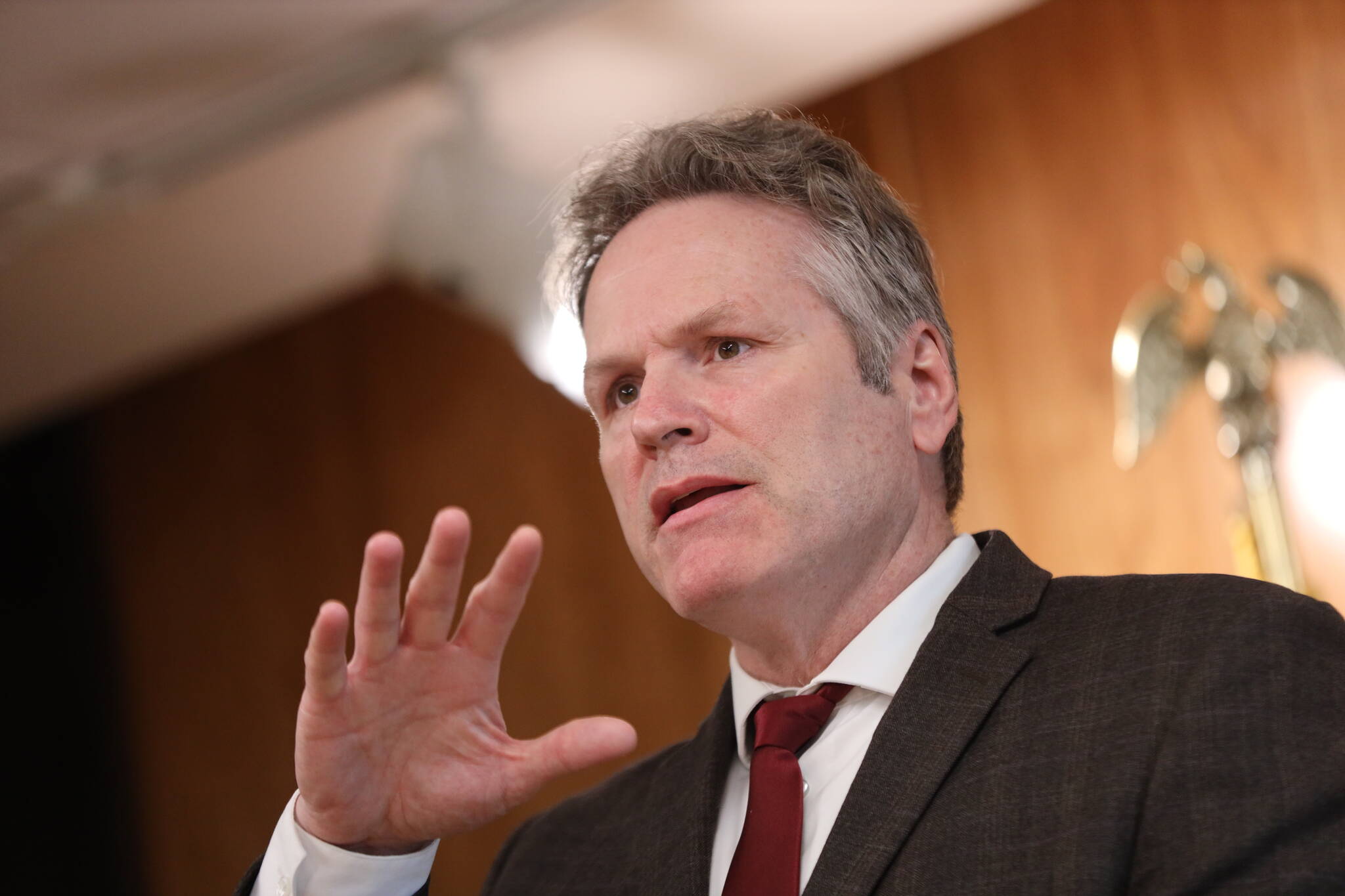 Gov. Mike Dunleavy speaks during a news conference in which options for a long-range fiscal plan were discussed. Dunleavy said in the coming days, he expects a sales tax proposal to be drafted and that a special session to create long-term plan is possible. (Clarise Larson / Juneau Empire)