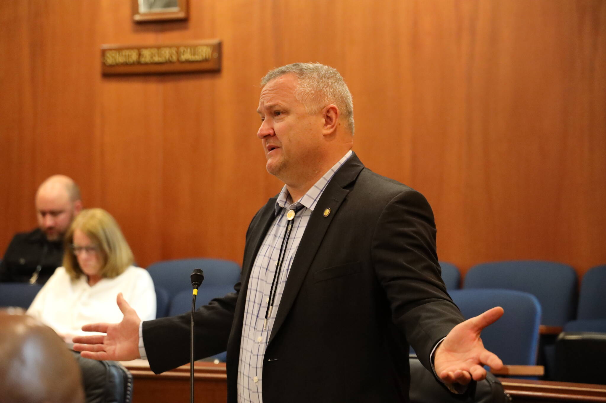 State Sen. Mike Shower, R-Wasilla, speaks in opposition to a bill allocating 75% of spendable Permanent Fund earnings to state programs and 25% to dividends during Monday’s floor session. Shower, one of three senators not in the 17-member bipartisan majority, unsuccessfully supported several changes to nullify or delay the bill before it eventually passed by a 12-7 vote. (Clarise Larson / Juneau Empire)