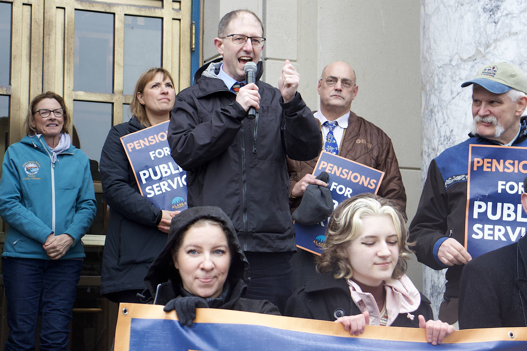 State Sen. Jesse Kiehl, D-Juneau, vows a bill boosting state employees pensions will pass “the 33rd Alaska Legislature” during a rally by about 70 union supporters on the steps of the Alaska State Capitol on Tuesday. Kiehl is a member of the Senate Finance Committee, which spent much of Tuesday hearing testimony about a pension bill, but Senate and union leaders acknowledge the proposal will likely have to wait until next year before it has a realistic chance of making it through the full Legislature. (Mark Sabbatini / Juneau Empire)