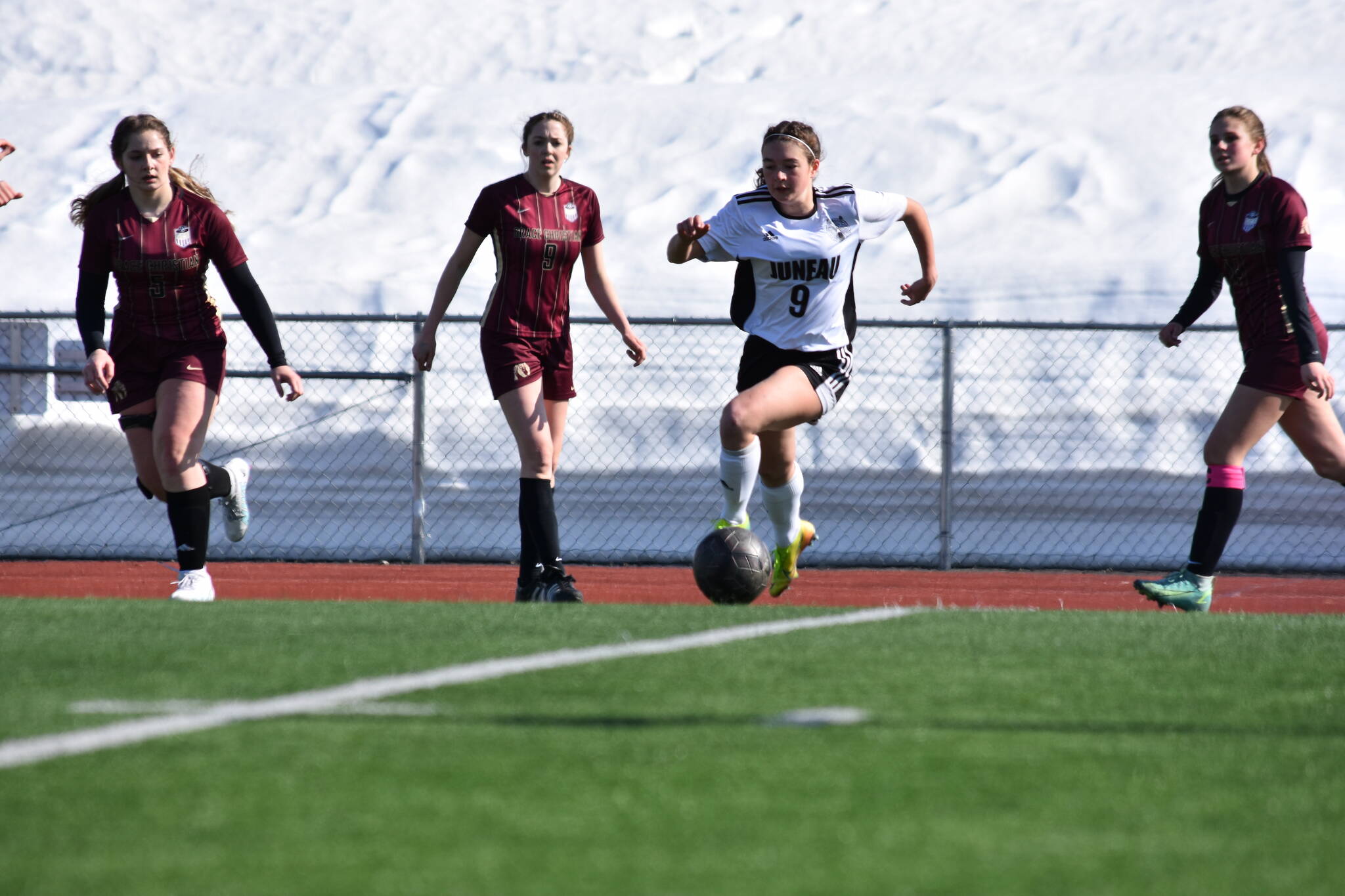 JDHS junior Ruby Rivas (9) dribbles the ball down field against Grace Christian High School on Friday in Anchorage for a 7-1 victory, non-conference game. (Courtesy Photo / Matt Dusenberry)