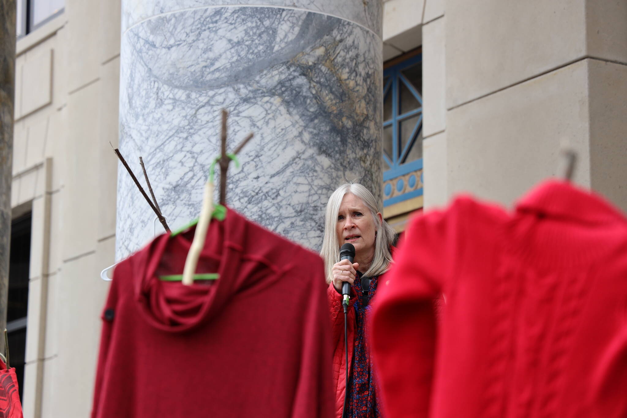 Rep. Andi Story, a Juneau Democrat, speaks to the crowd of hundreds who gathered at the steps of the Alaska State Capitol Friday evening for a rally and march to recognize Missing and Murdered Indigenous Peoples Awareness Day held each year on May 5. (Clarise Larson / Juneau Empire)