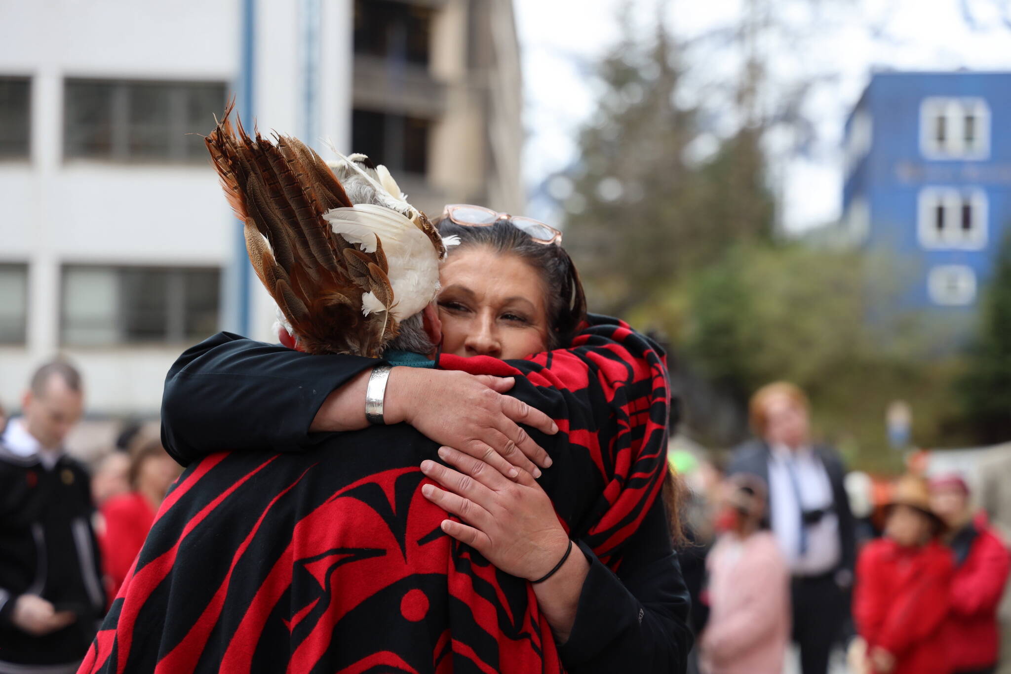 Catherine Edwards, co-chair of Tlingit and Haida’s Violence Against Women Task Force hugs Áakʼw Ḵwáan spokesperson Fran Houston at at the steps of the Alaska State Capitol Friday evening for a rally and march to recognize Missing and Murdered Indigenous Peoples Awareness Day held each year on May 5. (Clarise Larson / Juneau Empire)