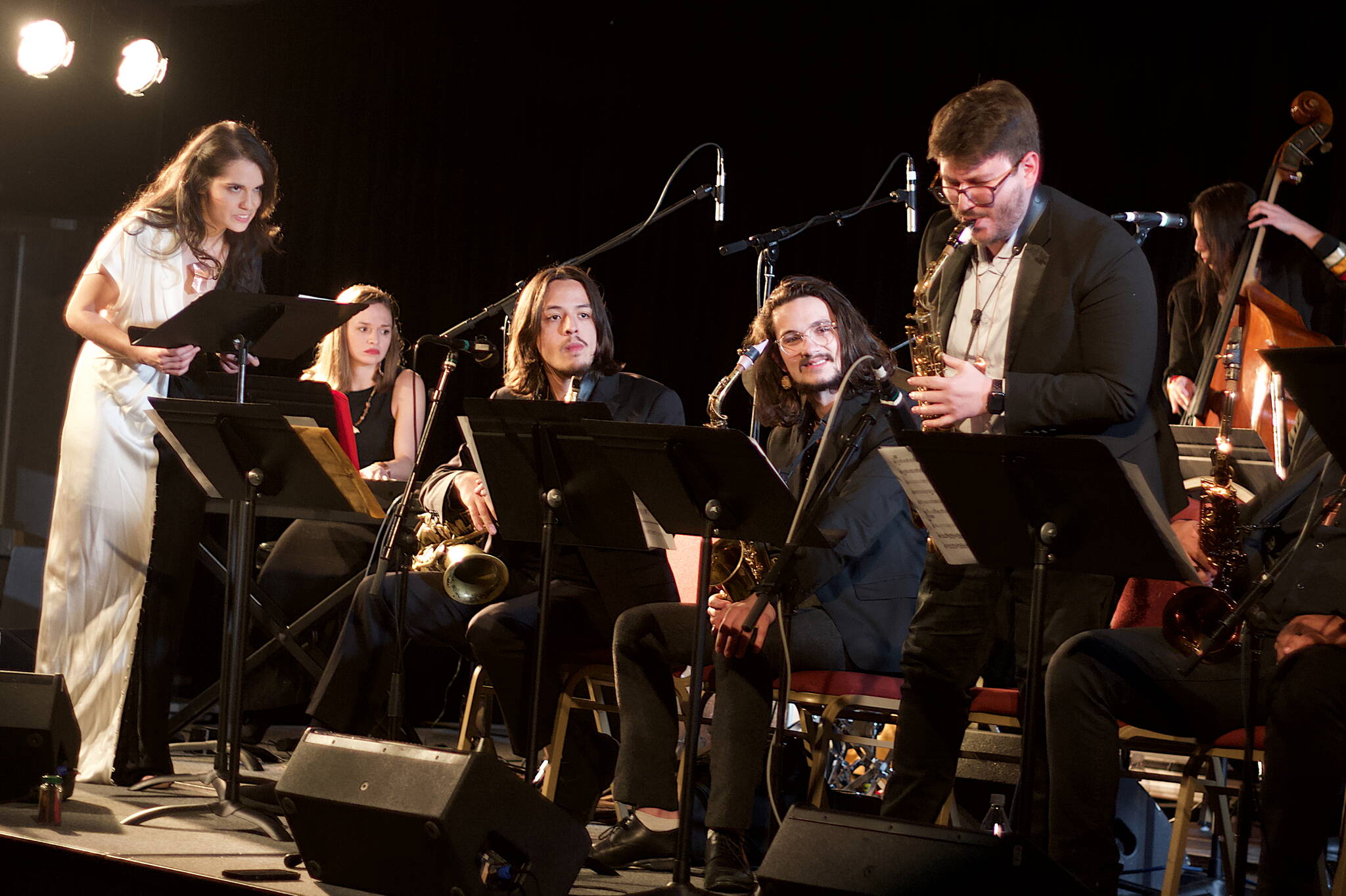 Julia Keefe, left, guides her Indigenous Big Band through a performance at Elizabeth Peratrovich Hall to open this spring’s Juneau Jazz & Classics festival on Friday night. (Mark Sabbatini / Juneau Empire)
