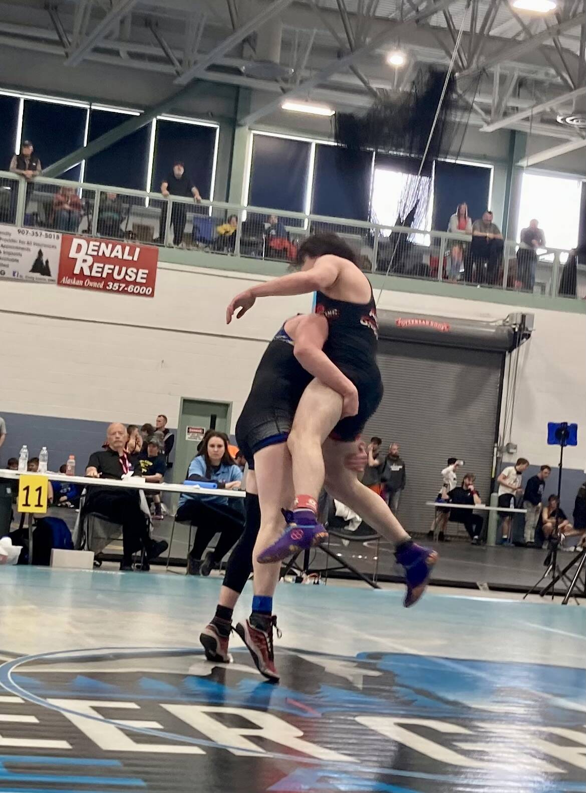 Sage Richards (JYWC) takes down Thomas Welled (Pioneer Grappling Academy) at the USA Wrestling Alaska State Championships at the Menard Center in Wasilla from May 3-7. (Courtesy Photo / Dana Richards)