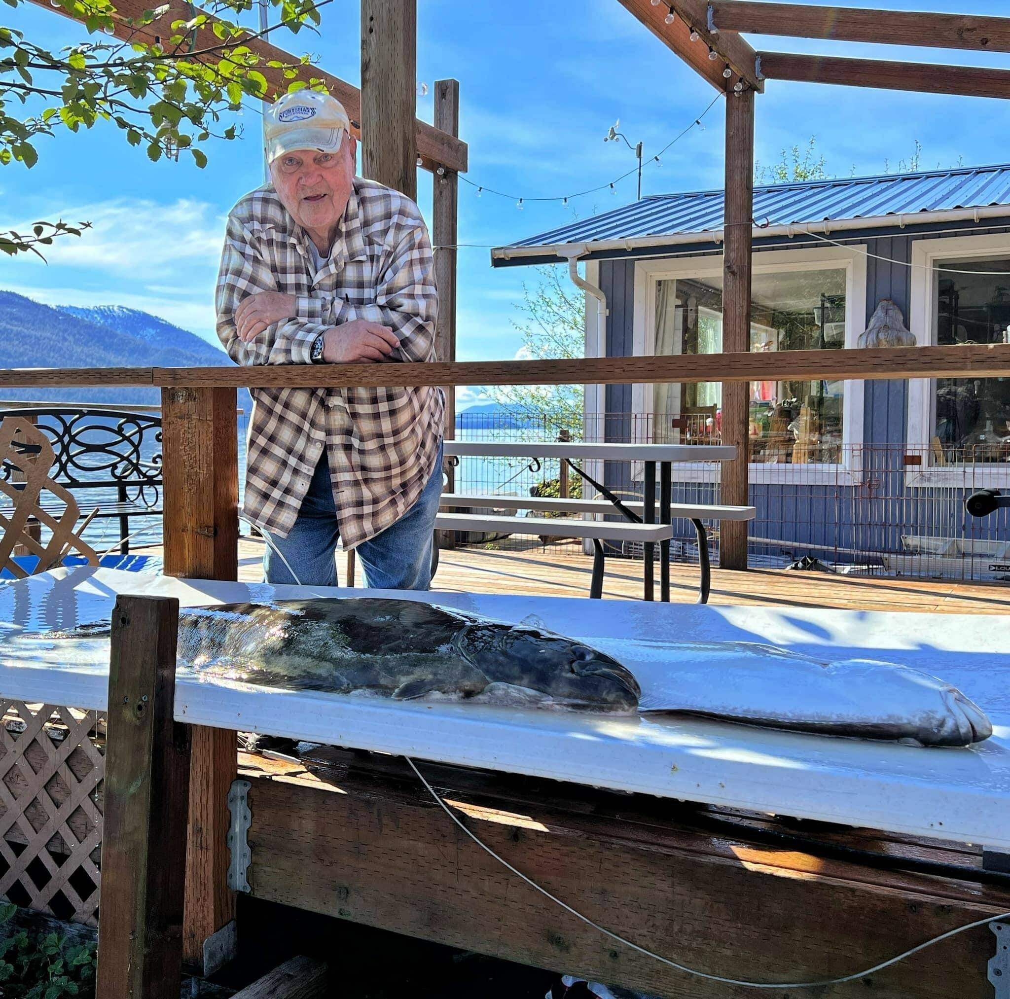 Mickey Prescott and the halibut he caught in Wrangell, Alaska. (Vivian Faith Prescott / For the Capital City Weekly)