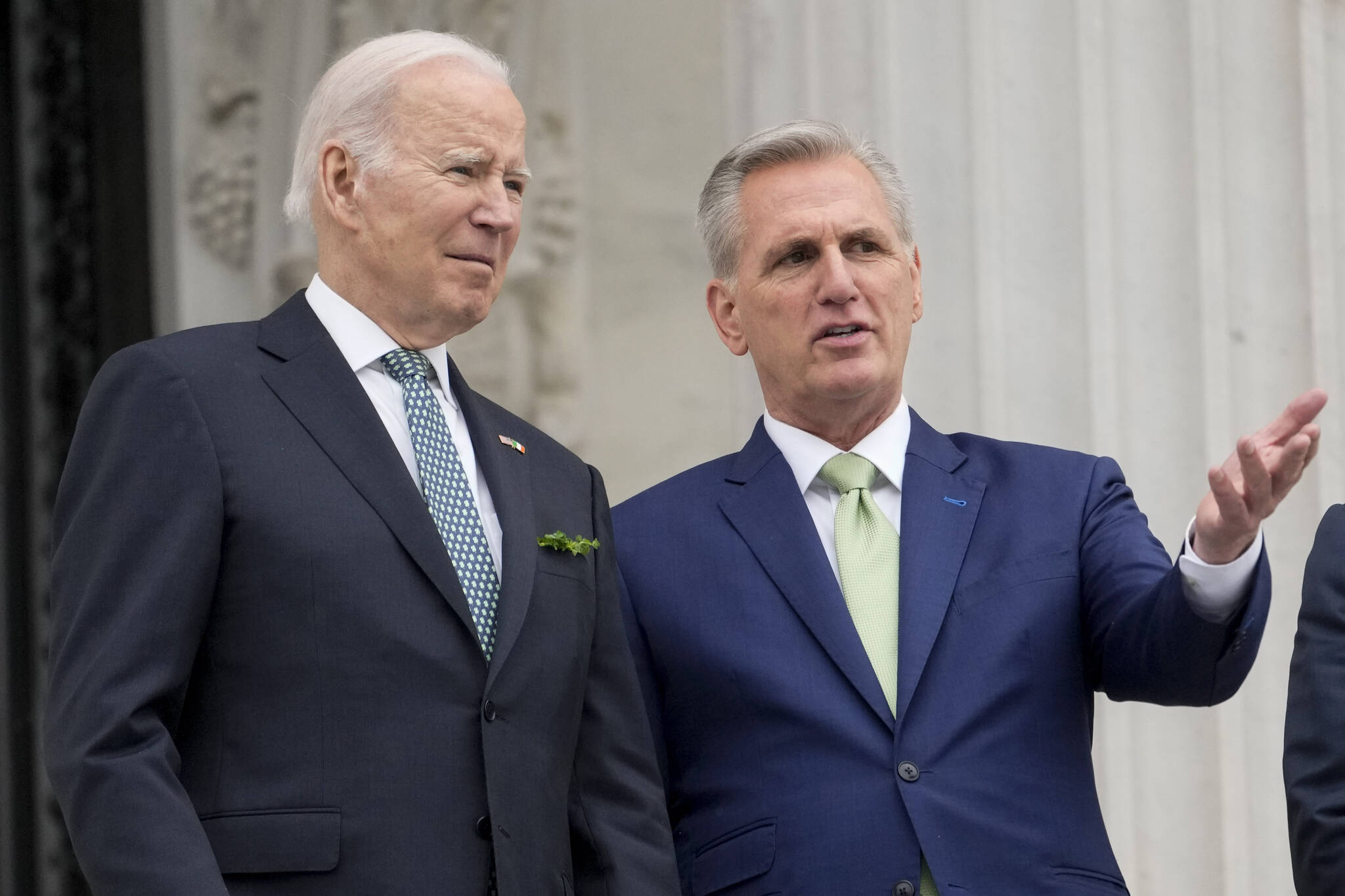 President Joe Biden talks with House Speaker Kevin McCarthy of Calif., on the House steps as they leave after attending an annual St. Patrick's Day luncheon gathering at the Capitol in Washington, Friday, March 17, 2023. Facing the risk of a government default as soon as June 1, President Joe Biden has invited the top four congressional leaders to a White House meeting for talks on Tuesday, May 9. (AP File Photo / Alex Brandon)