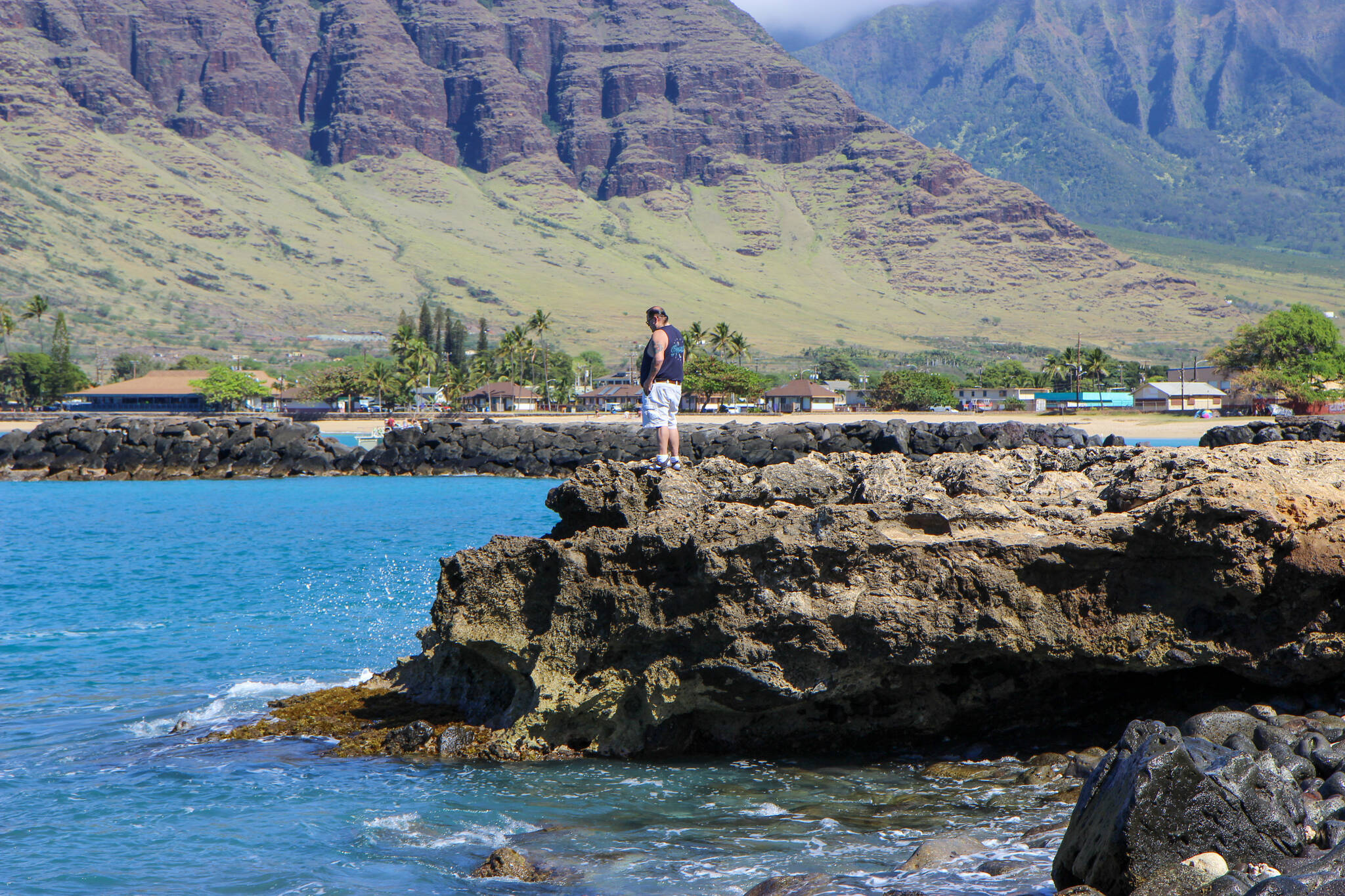 Natural Resources Coordinator for OVK, Justin McDonald, spends his time at Pokai Bay with the waters of the Waianae Coast. (Courtesy Photo / Lauren Tanel)