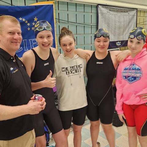 Left to Right, Glacier Swim Club coach Scott Griffith, Dannan Mills, Valerie Pieman, Amy Liddle, Lily Francis. This relay group broke two state records in the 13-14 ages Girls, 200 Free Relay, and the 400 Medley Relay. (Courtesy Photo / Scott Griffith)