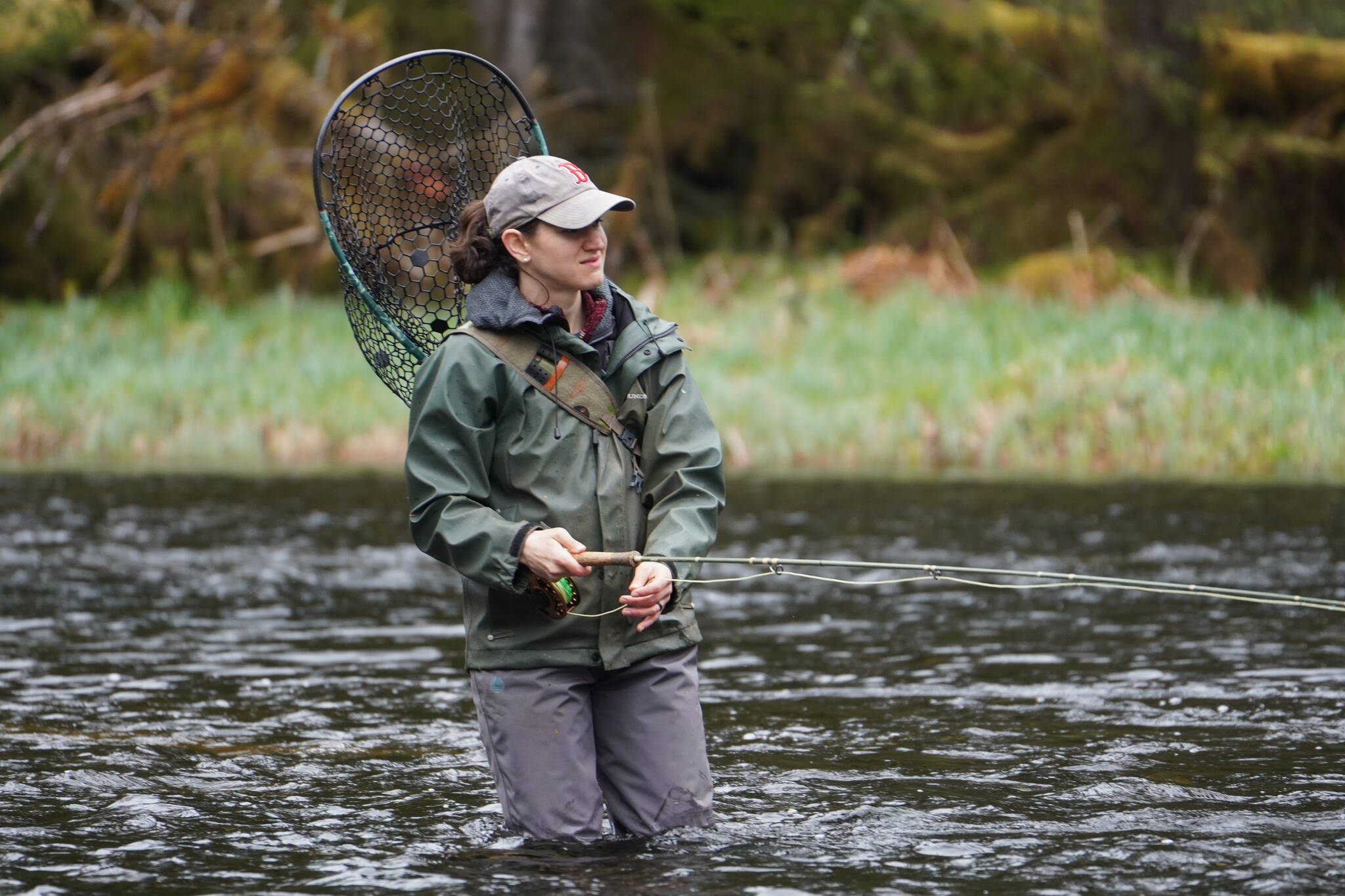 The author's wife waits for a steelhead to hit. (Jeff Lund / For the Juneau Empire)