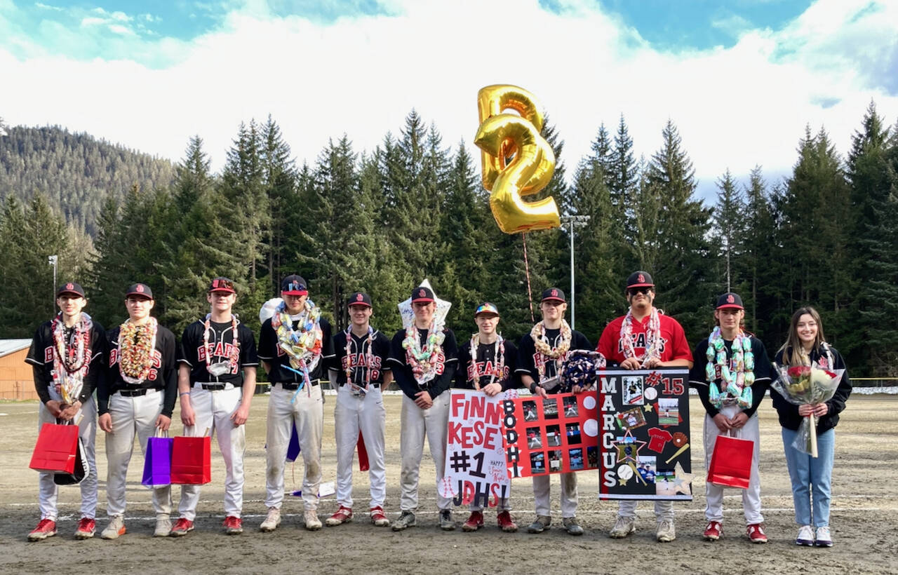 The Juneau-Douglas High School: Yadaa.at Kalé Crimson Bears senior baseball members. (Klas Stolpe / Juneau Empire)