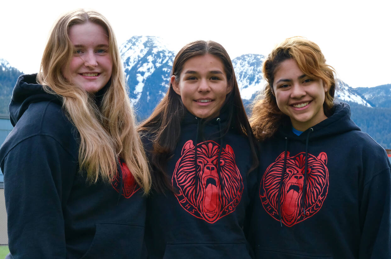 Juneau-Douglas High School: Yadaa.at Kalé girls soccer seniors, from left, Leni Schilling (an exchange student from Germany), Mariah Kadinger and Angelica Rodriguez will be honored before the Crimson Bears match against Thunder Mountain at 5 p.m. Tuesday on the Adair Kennedy pitch. (Klas Stolpe / Juneau Empire)