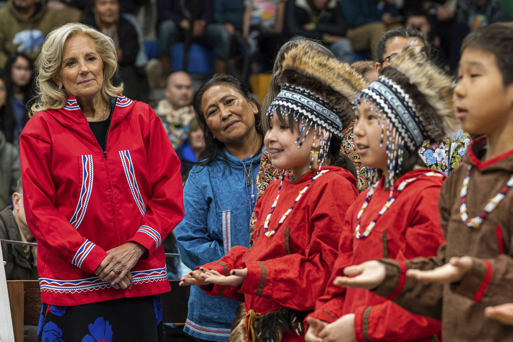 U.S. first lady Jill Biden, left, and first lady of Alaska Rose Dunleavy watch a performance by Ayaprun Elitnaurvik students during an event at Bethel Regional High School in Bethel, Alaska on Wednesday, May 17, 2023. Ayaprun Elitnaurvik is a Yugtun immersion school in Bethel. Biden and Interior Secretary Deb Haaland traveled to Bethel to highlight the Biden-Harris administration’s investments to expand broadband internet connectivity in Native American communities, including Alaska’s Yukon-Kuskokwim Delta. (Loren Holmes/Anchorage Daily News via AP)