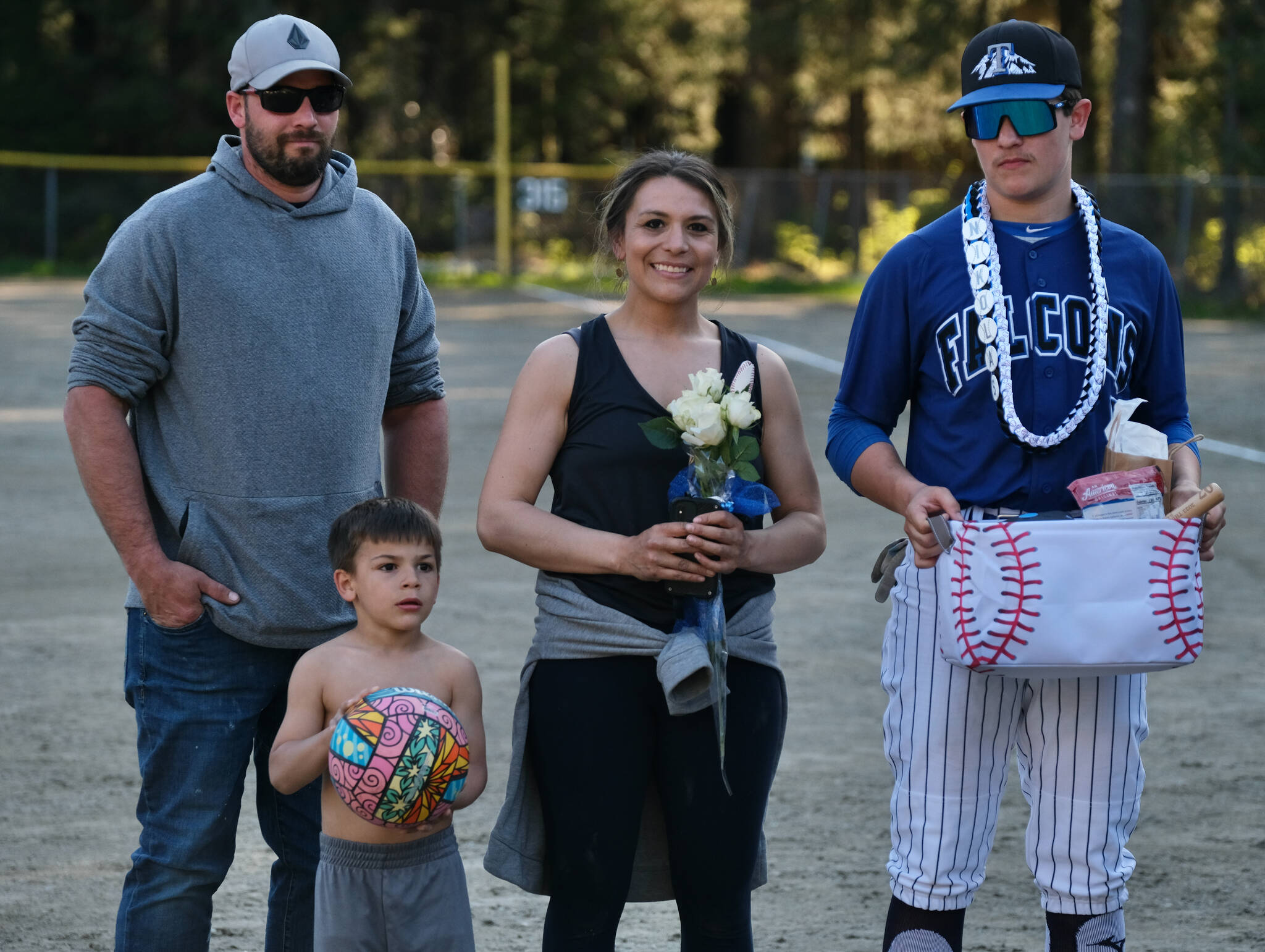 Thunder Mountain Falcons senior Nic Daniels and family were celebrated Wednesday at Adair-Kennedy Field. (Klas Stolpe / Juneau Empire)