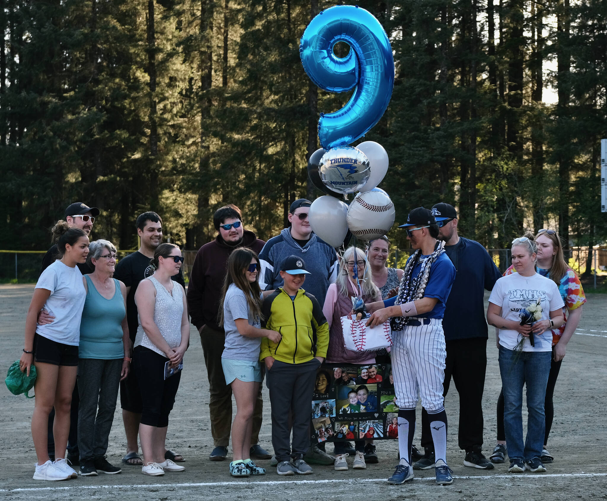 Thunder Mountain Falcons senior Rory Hayes and family were celebrated Wednesday at Adair-Kennedy Field. (Klas Stolpe / Juneau Empire)