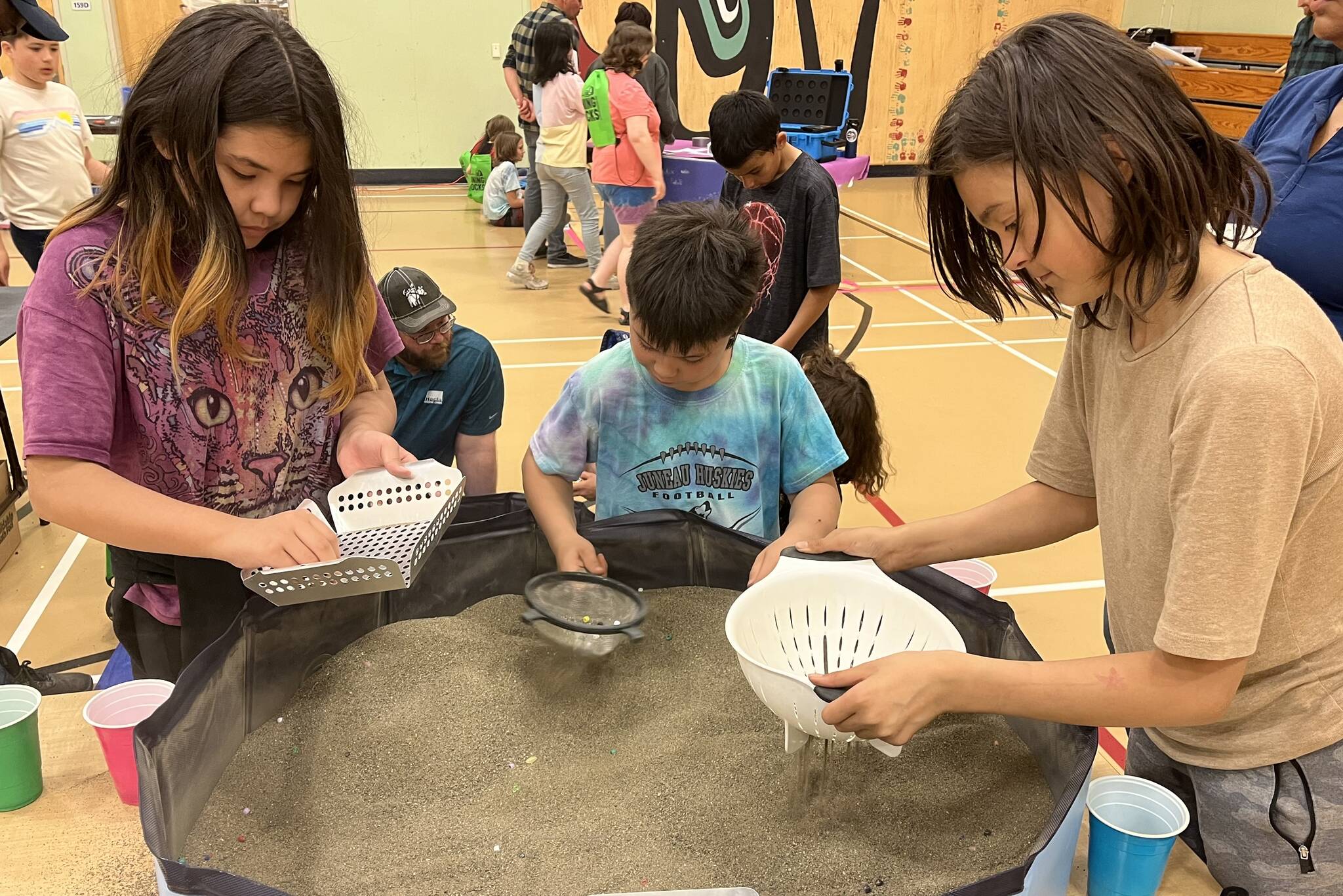 Sayéik: Gastineau Community School students enjoy hands-on learning with mining for minerals with Hecla and Coeur Alaska Kensington Mine. The mining company was just one of many volunteer organizations that participated in a STEAM event held at the school. The event was held during school hours to maximize student involvement. (Jonson Kuhn / Juneau Empire)