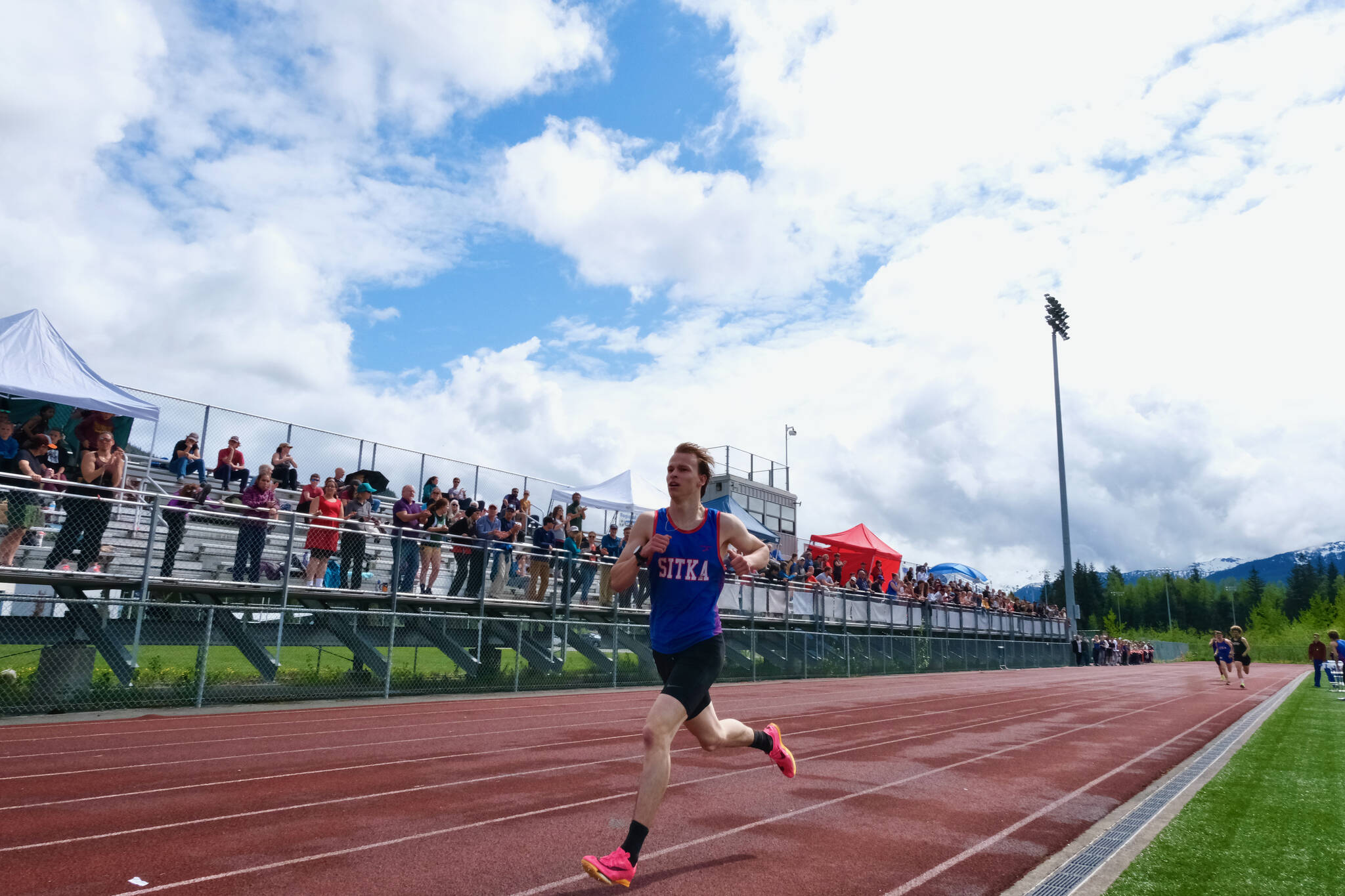 Sitka High School senior Silas Demmert cruises to a win in the Division II boys 1,600-meter race during the Region V Track & Field Championships, Saturday, at Thunder Mountain High School. (Klas Stolpe / Juneau Empire)