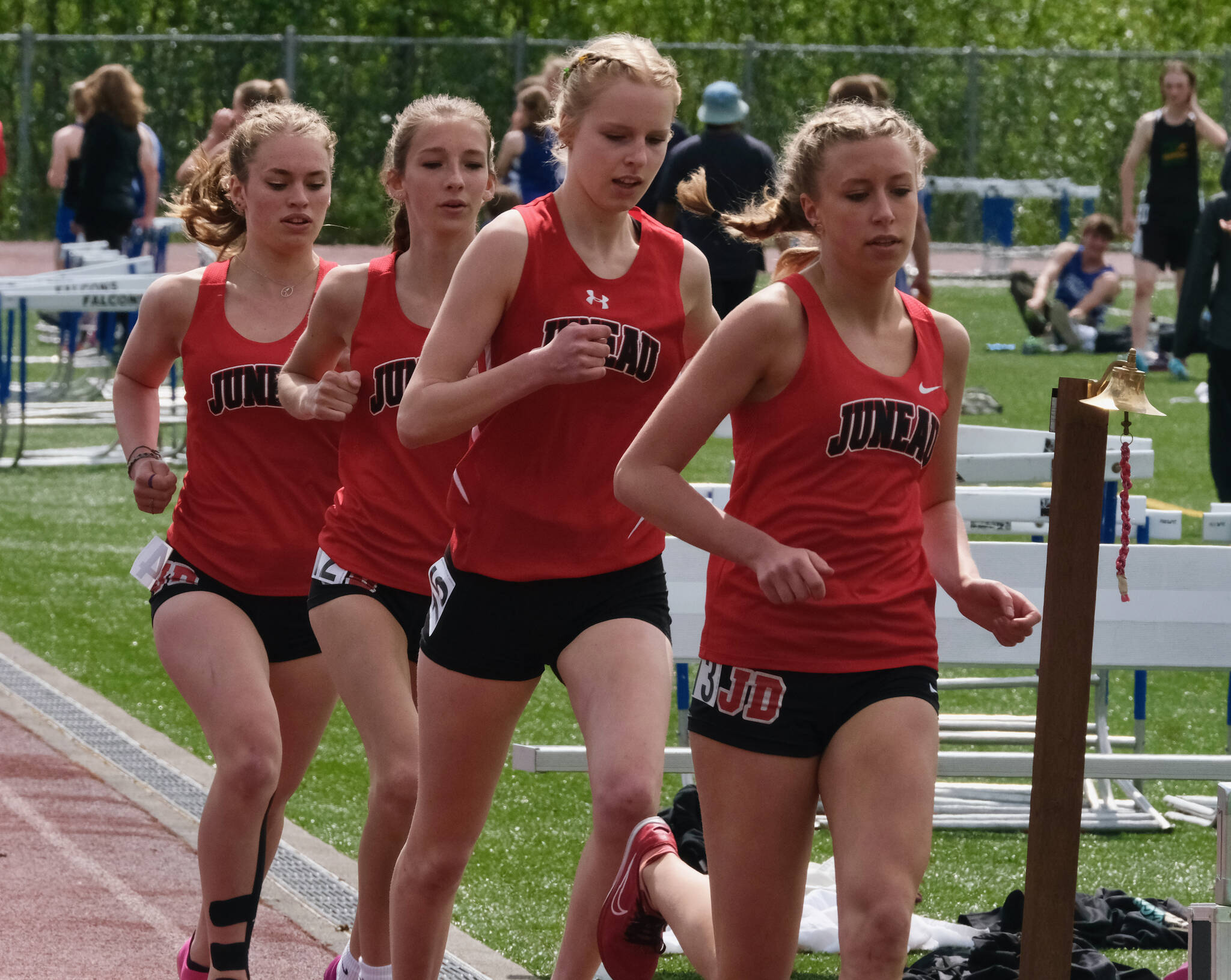 Juneau-Douglas High School: Yadaa.at Kalé junior Etta Eller leads sophomore Ida Meyer, junior Rayna Tuckwood and sophomore Pacific Ricke during the Division I girls 1600 meters at the Region V Track & Field Championships, Saturday at Thunder Mountain High School. (Klas Stolpe / Juneau Empire)