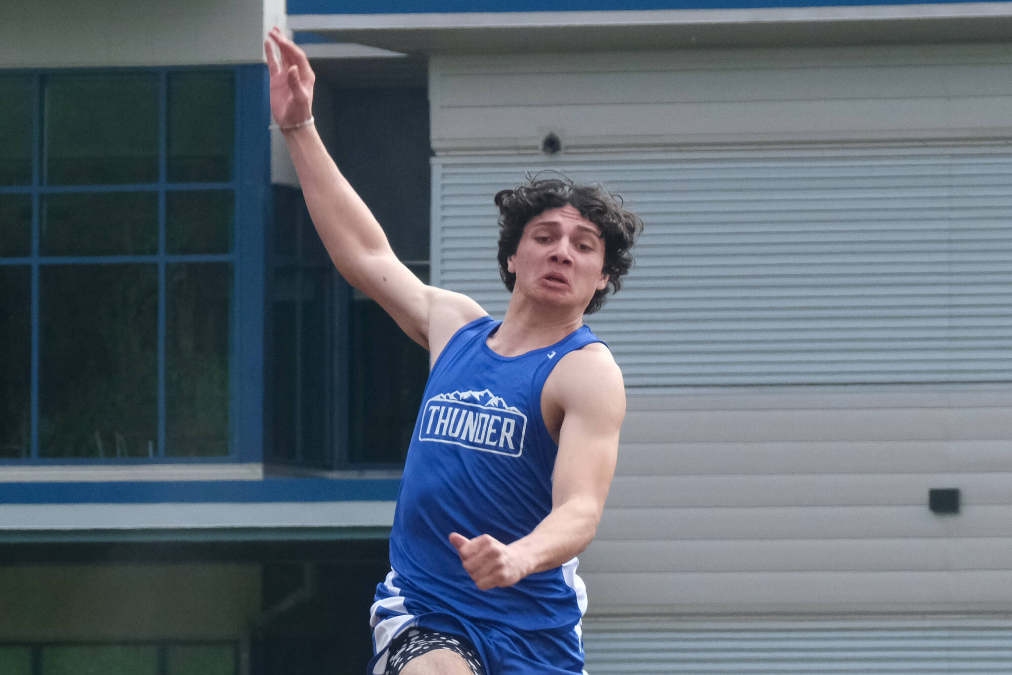 Thunder Mountain High School senior Chase Darbonne wins the Division I boys long jump during the Region V Track & Field Championships, Saturday, at TMHS. (Klas Stolpe / Juneau Empire)