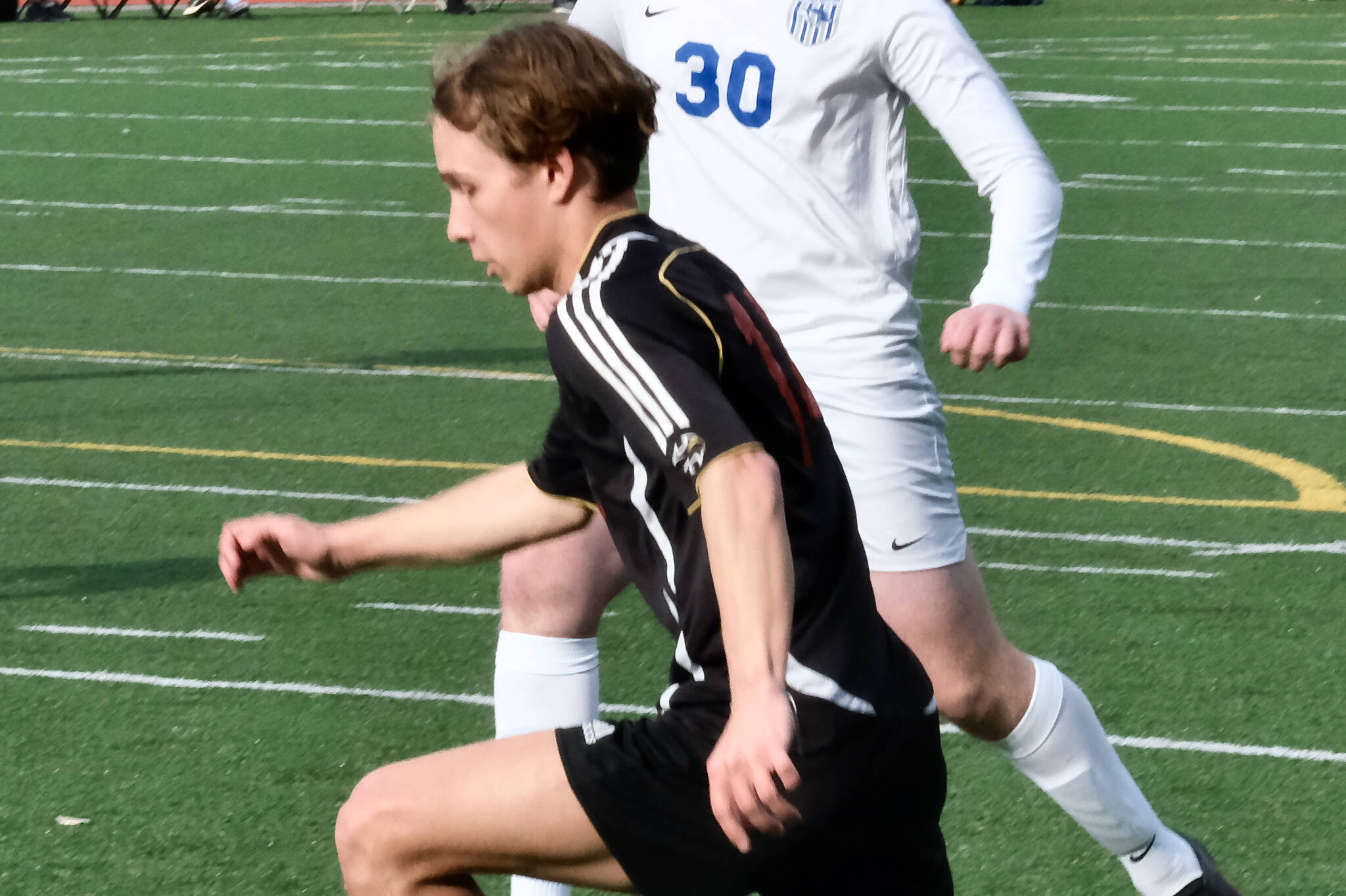 Juneau-Douglas High School: Yadaa.at Kalé sophomore Kai Ciambor, shown in earlier season action, had two goals and controlled the pitch for the Crimson Bears during their final two regular season games at Ketchikan last weekend. (Klas Stolpe / Juneau Empire)