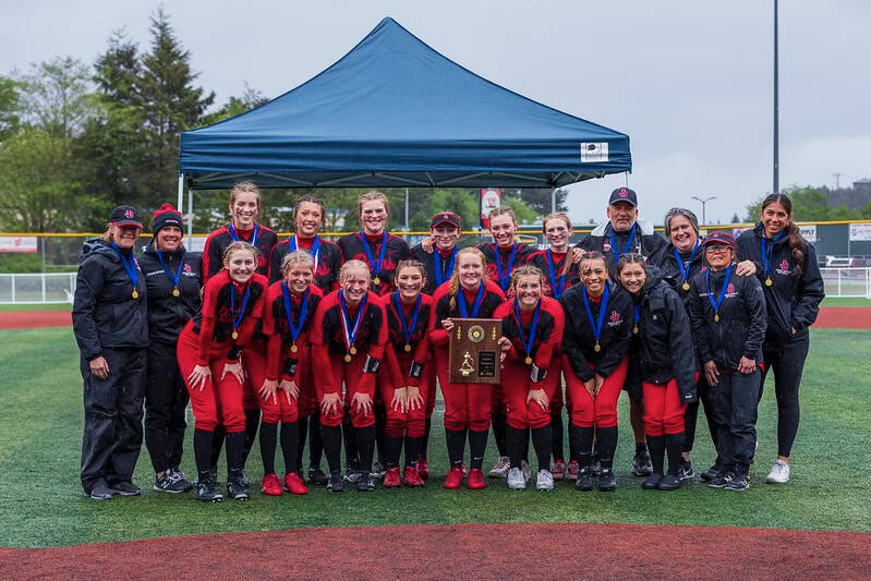 The JDHS Crimson Bears pose with their Region V Championship on Saturday at Sitka’s Moller Field. (Courtesy Photo)