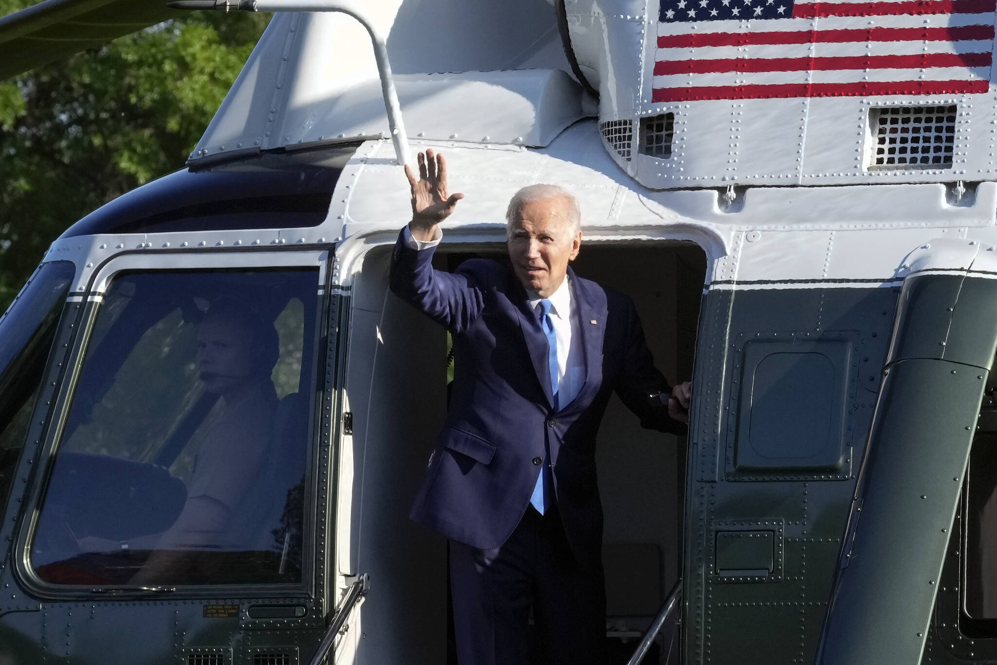 President Joe Biden waves as he boards Marine One on the South Lawn of the White House in Washington, Friday, May 26, 2023, as he heads to Camp David for the weekend. (AP Photo / Susan Walsh)