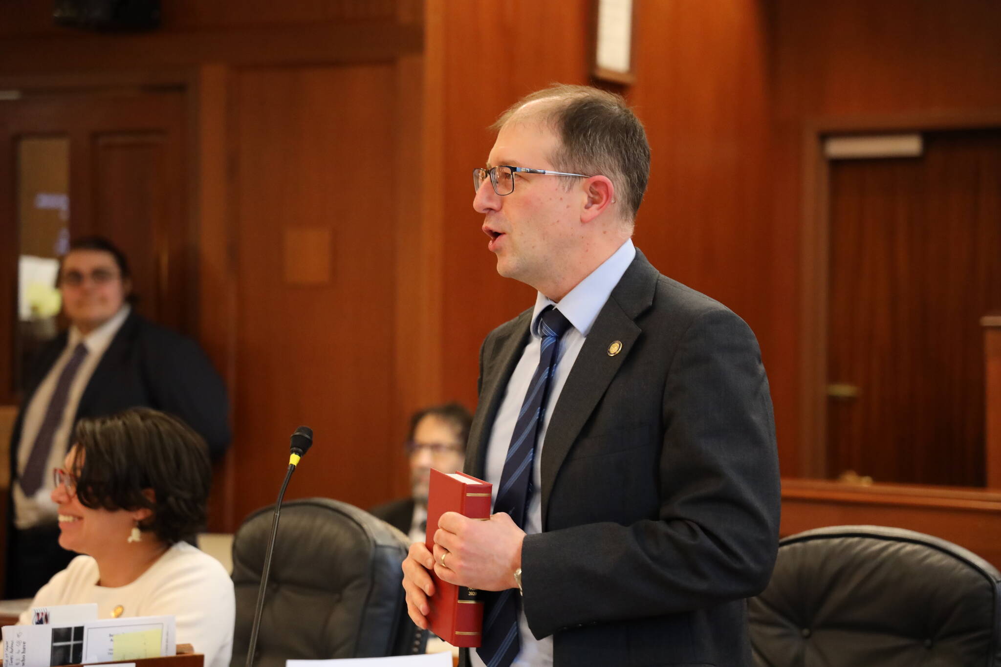 State Sen. Jesse Kiehl, D-Juneau, speaks on the Senate floor May 16. His bill allowing disabled military veterans to receive free fur-trapping licenses was signed into law last week by Gov. Mike Dunleavy. (Clarise Larson / Juneau Empire)