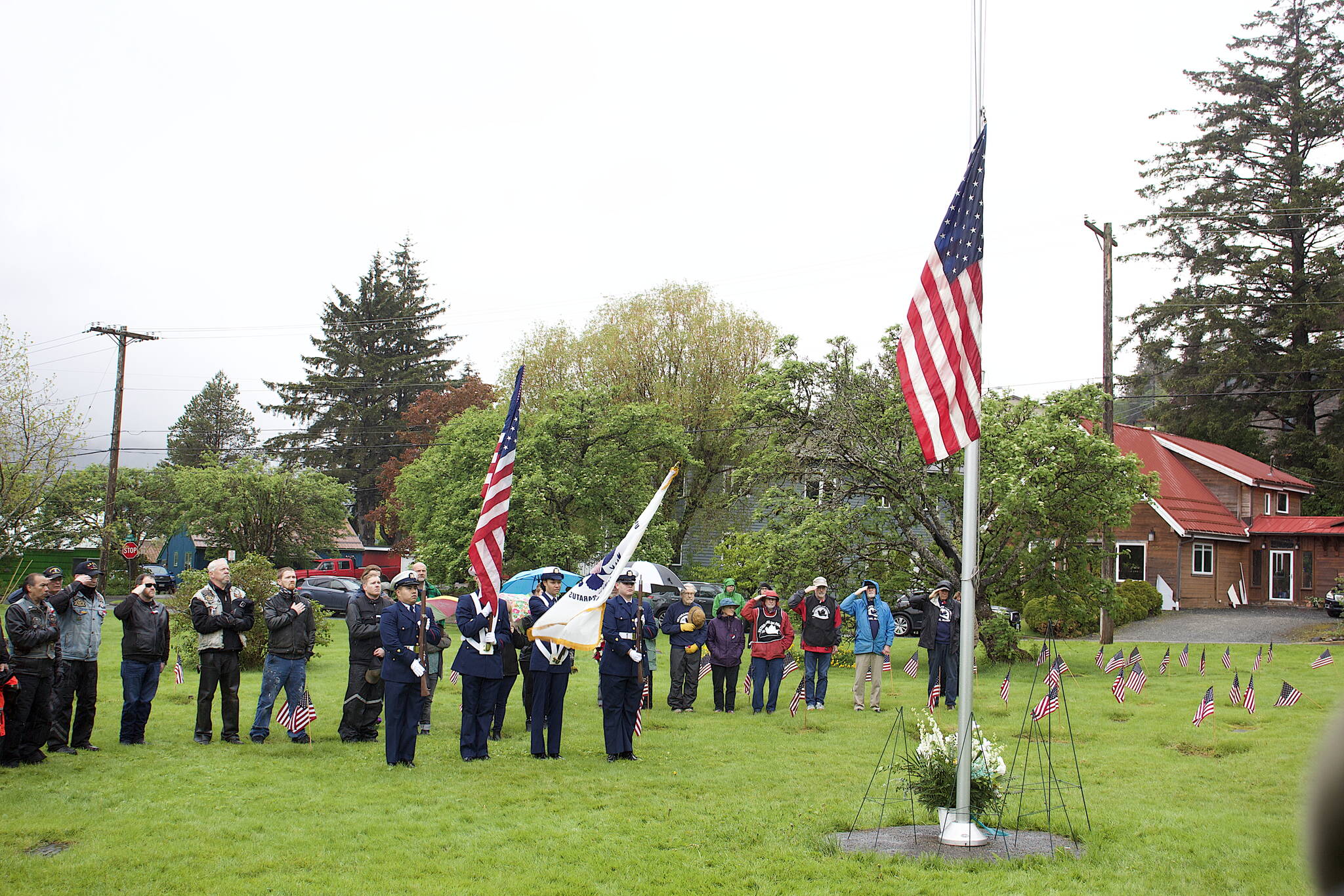 About 60 veterans, their families and other supporters gather at Evergreen Cemetery for a Memorial Day observance Monday. (Mark Sabbatini / Juneau Empire)