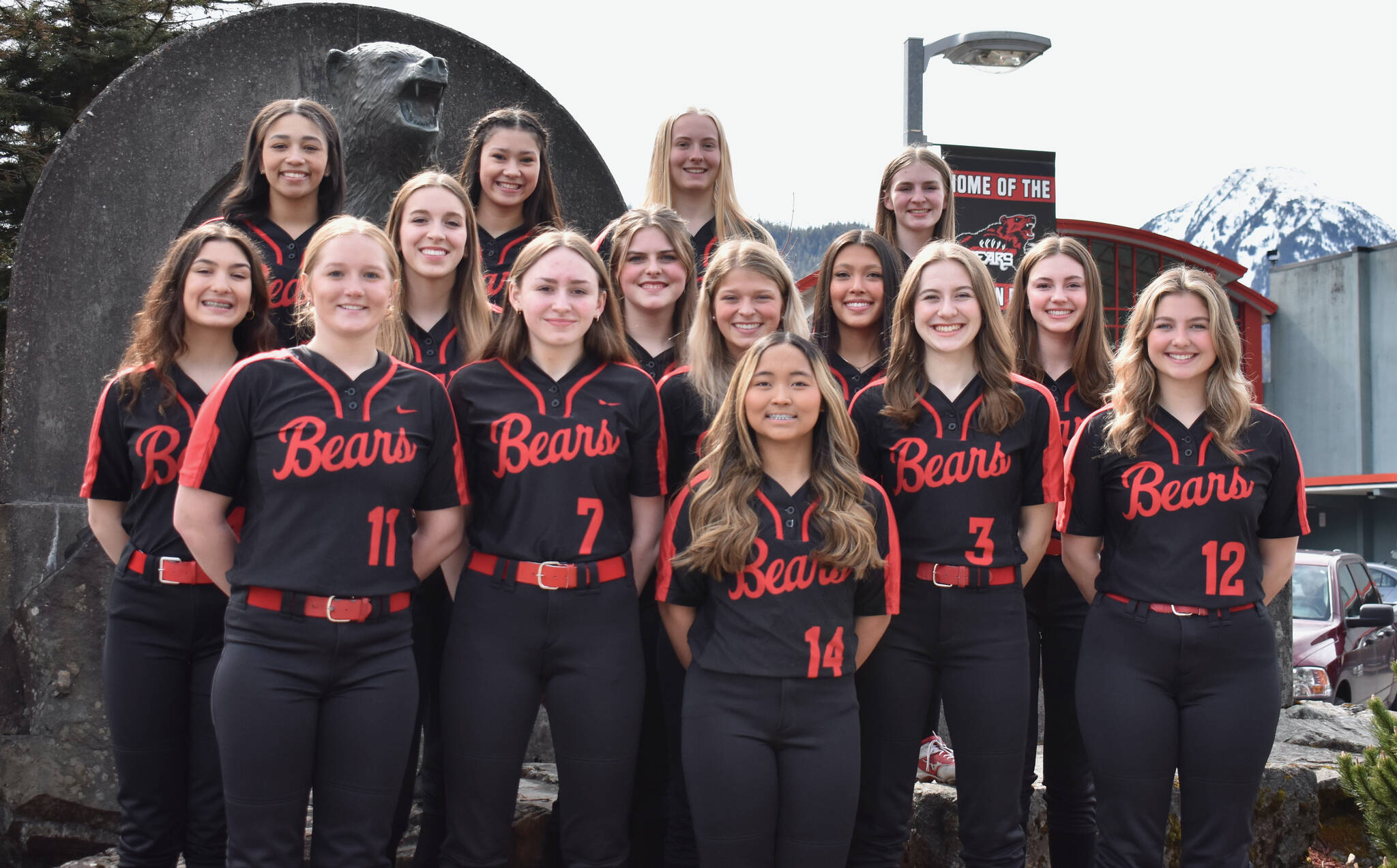 The Region V champion Juneau-Douglas High School: Yadaa.at Kalé Crimson Bears softball team are the top Southeast seed for the state tournament this weekend in Anchorage. Front row: Milina Mazon. Second row: Mariah Schauwecker, Chloe Casperson, Zoey Billings, Carlynn Casperson and Gloria Bixby. Third row: Bailey Hansen, Mila Hargrave, Taiya Bentz, Kiah Yadao and Gwen Nizich. Fourth row: Amira Andrews, Tristan Oliva, Anna Dale and Tatum Billings. (Klas Stolpe / Juneau Empire)