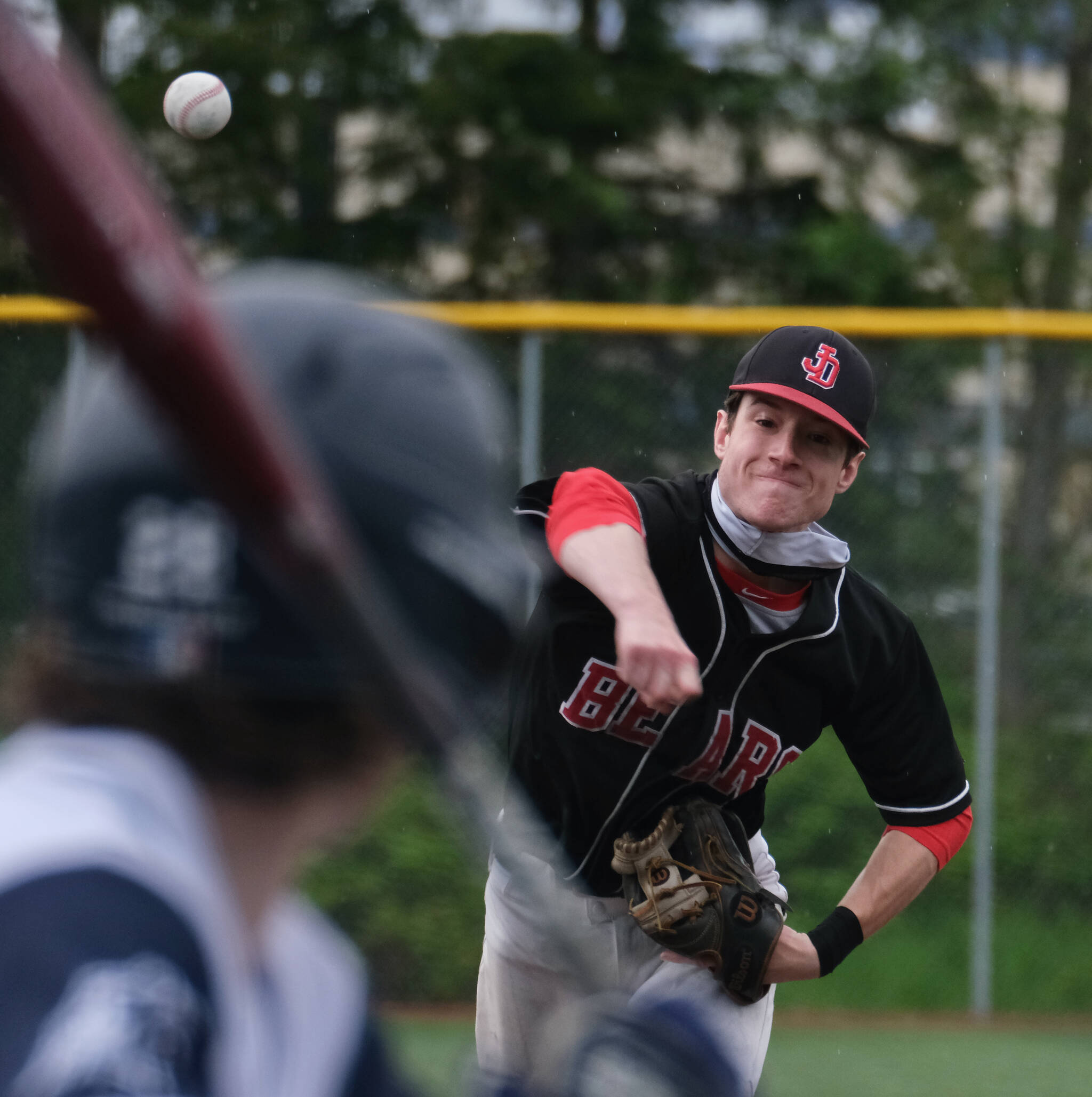 JDHS senior pitcher Eli Crupi delivers against Eagle River during the Crimson Bears 2-1 loss to the Wolves in an elimination game Friday at the ASAA Division I State Baseball Championships on Sitka’s Moller Field. (Klas Stolpe / Juneau Empire)