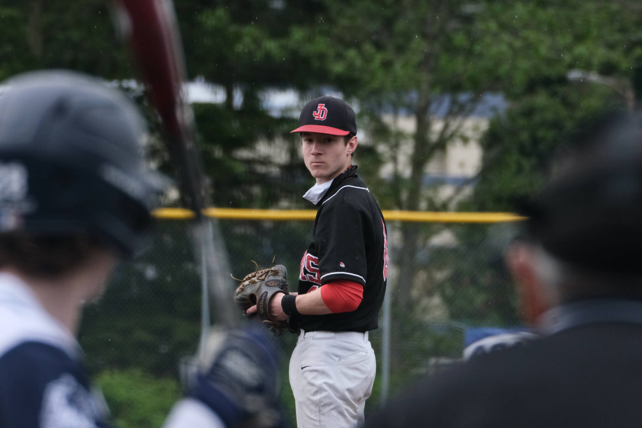 JDHS pitcher Eli Crupi prepares to deliver against Eagle River during the Crimson Bears 2-1 loss to the Wolves in an elimination game Friday at the ASAA Division I State Baseball Championships on Sitka’s Moller Field. (Klas Stolpe / Juneau Empire)