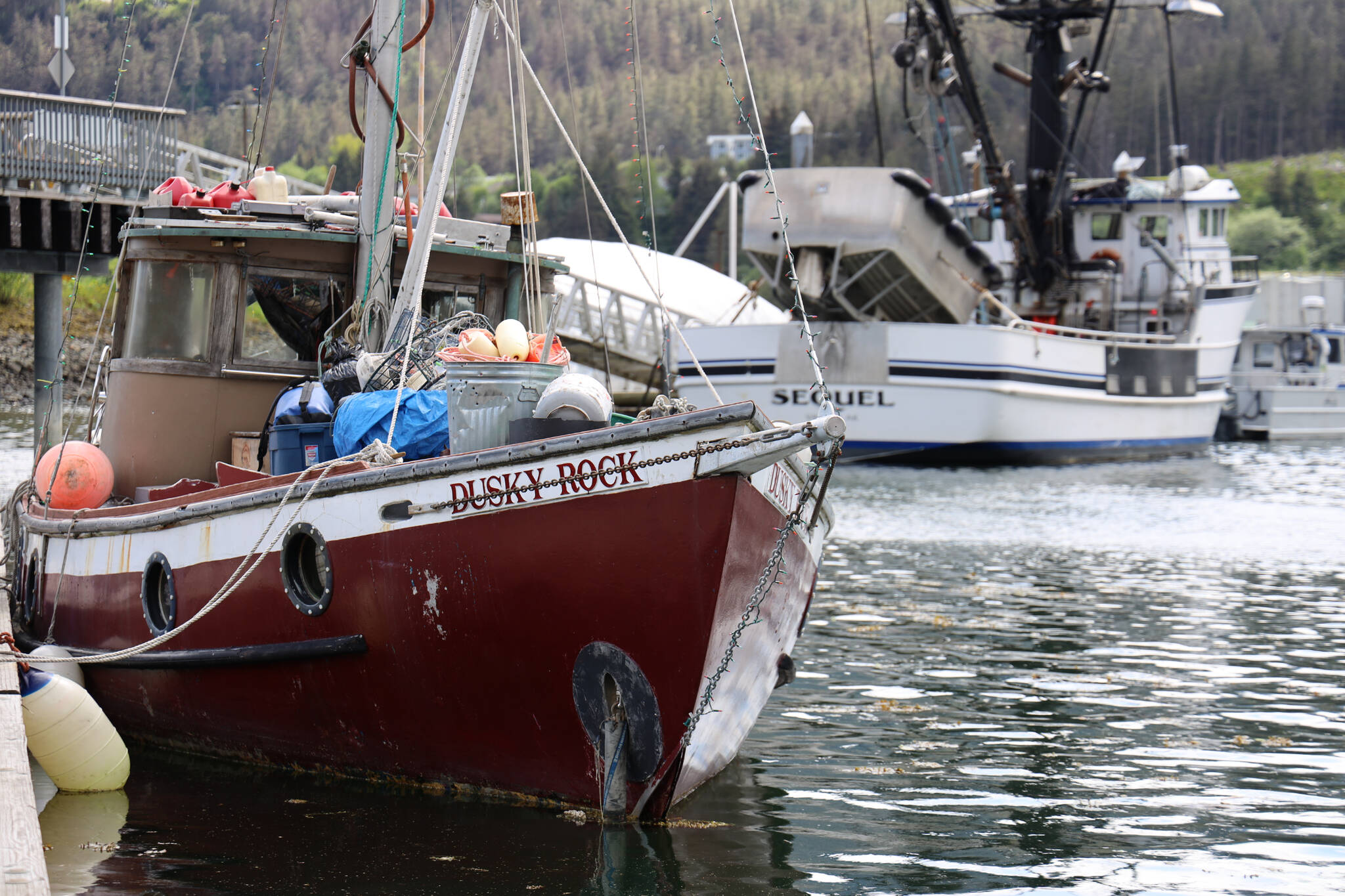 The Dusky Rock sits at Aurora Harbor Saturday morning. The vessel was towed there from Sandy beach Friday evening after three people died within a three-day period aboard the vessel while anchored offshore. (Clarise Larson / Juneau Empire)