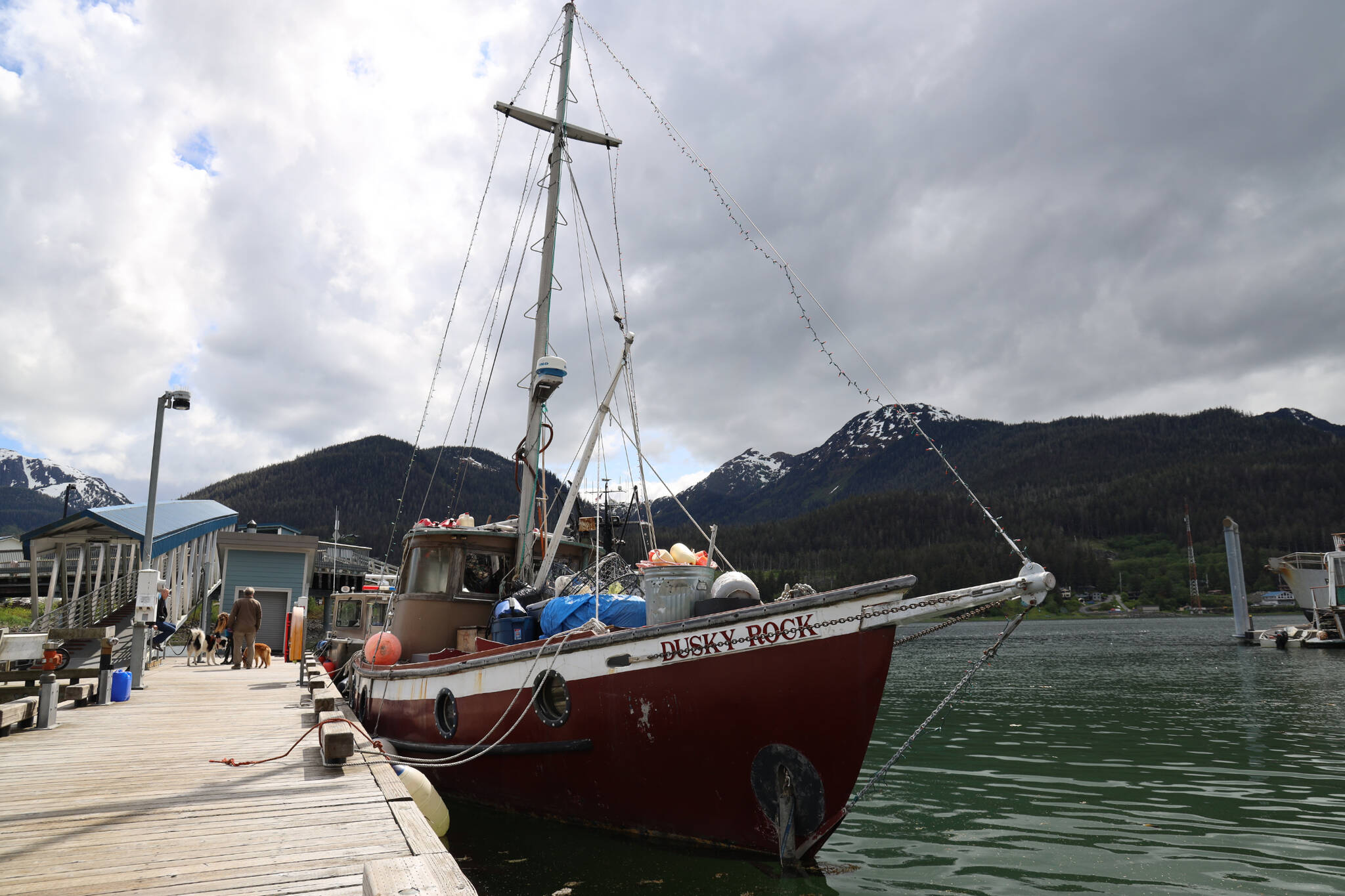 The Dusky Rock sits at Aurora Harbor on Saturday morning. The vessel was towed there from Sandy Beach on Friday evening after three people died within a three-day period aboard the vessel while anchored offshore. (Clarise Larson / Juneau Empire)