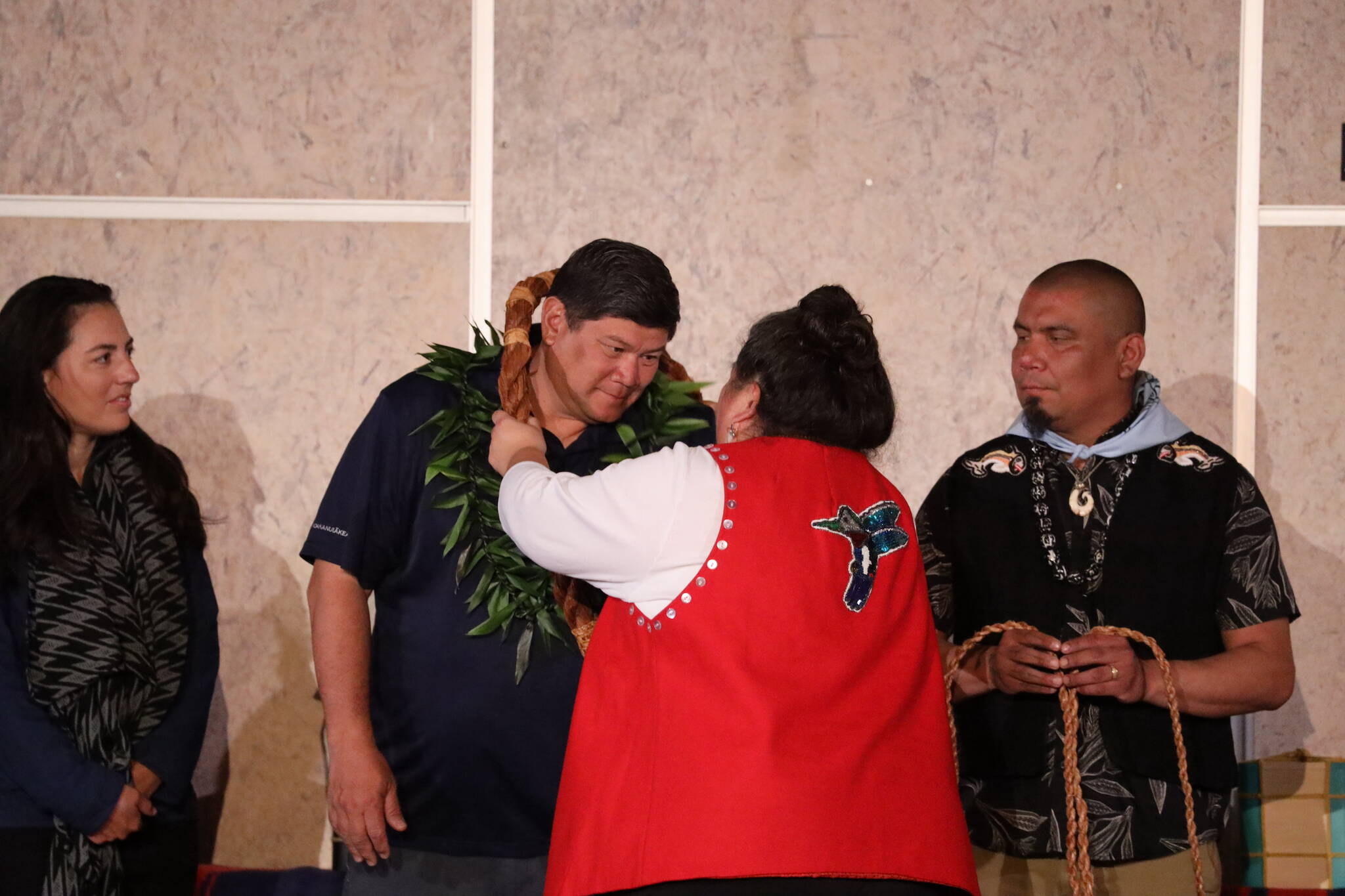 Capt. Mark Ellis receives a ceremonial cedar rope alongside other captains during a blessing ceremony at the global launch ceremony of the Moananuiākea voyage at the University of Alaska Recreation Center Thursday afternoon. (Clarise Larson / Juneau Empire)