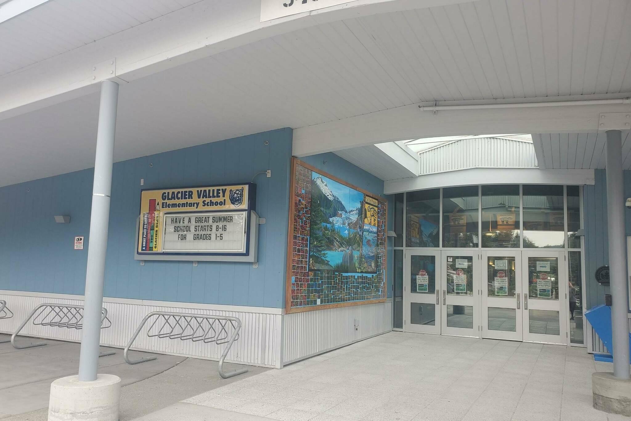 A notice about the arrival of summer is posted outside the entrance to Sitʼ Eeti Shaanáx̱ - Glacier Valley Elementary School. The school’s principal told the Juneau Board of Education last Tuesday there was a 55% “chronically absent” rate during the past school year. (Juneau Empire File)