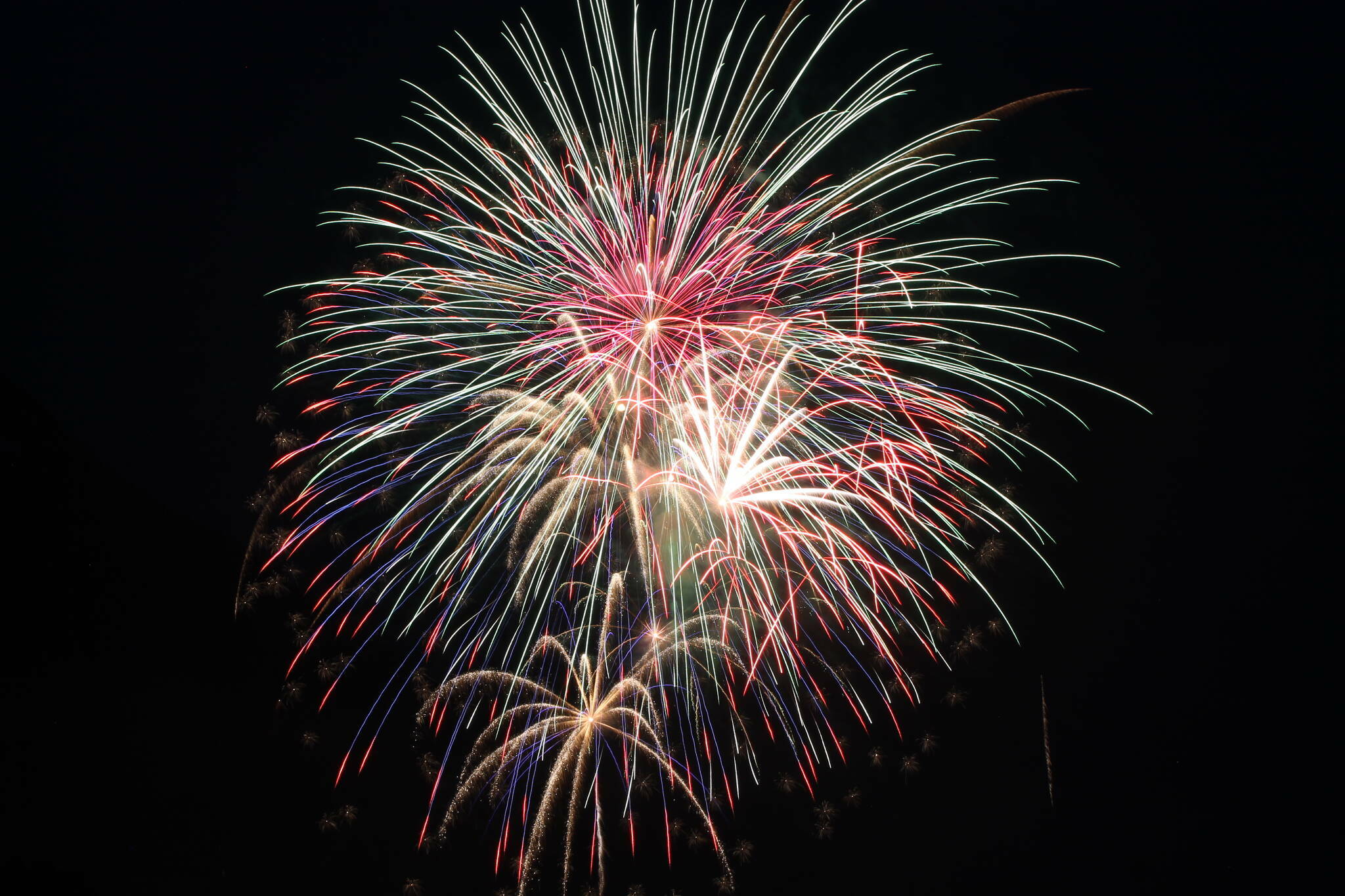 Fireworks burst over Juneau on July 4, 2022. (Clarise Larson / Juneau Empire File)
