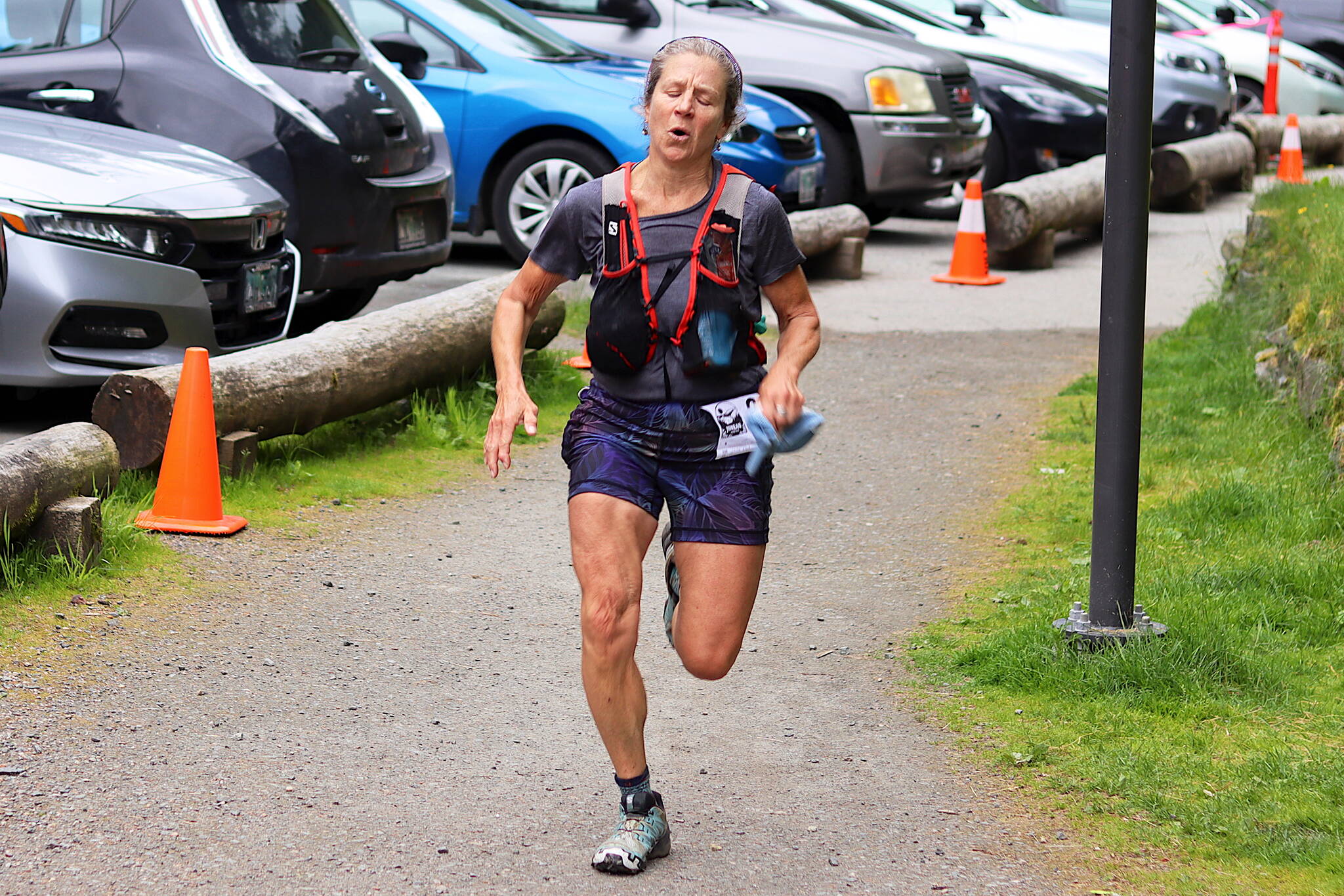 Cecile Elliot nears the finish line of the Juneau Ridge Race at Cope Park on Sunday. (Mark Sabbatini / Juneau Empire)