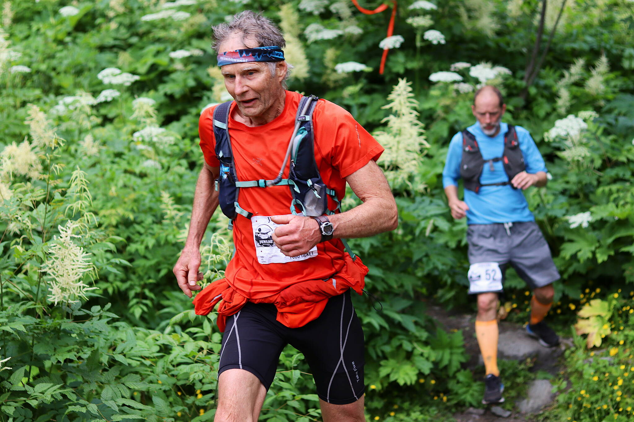 Dan Rondeau, 69, descends a trail during the Juneau Ridge Race on Sunday. (Mark Sabbatini / Juneau Empire)