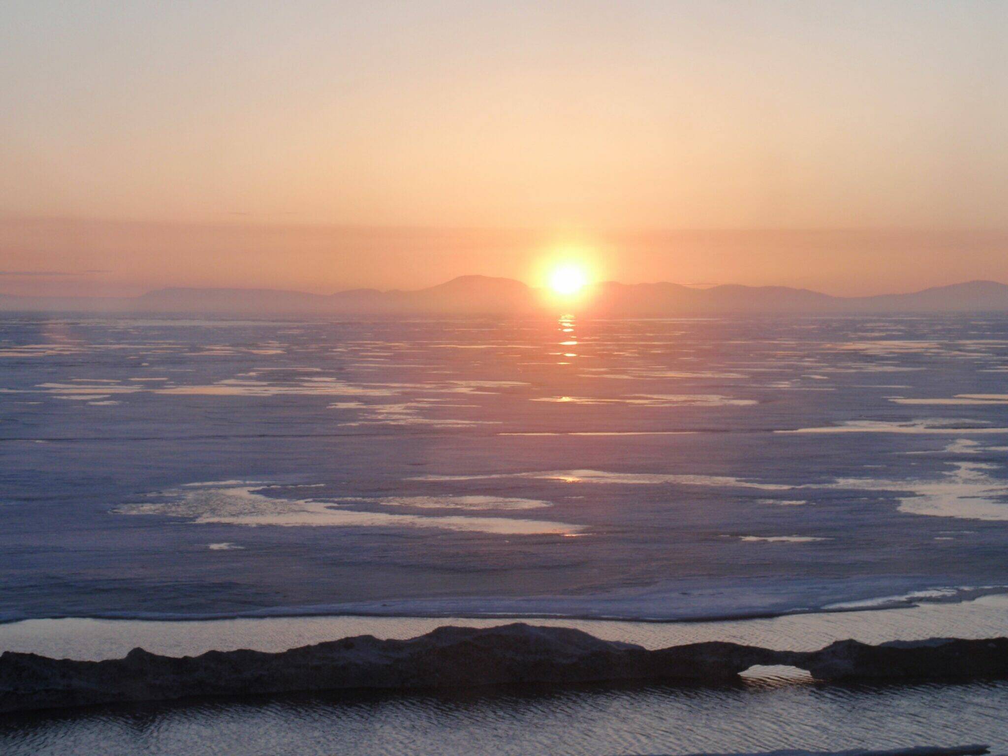 The setting sun over Kotzebue Sound is seen on an evening in 2010. (Photo provided by Alaska Division of Community and Regional Affairs)