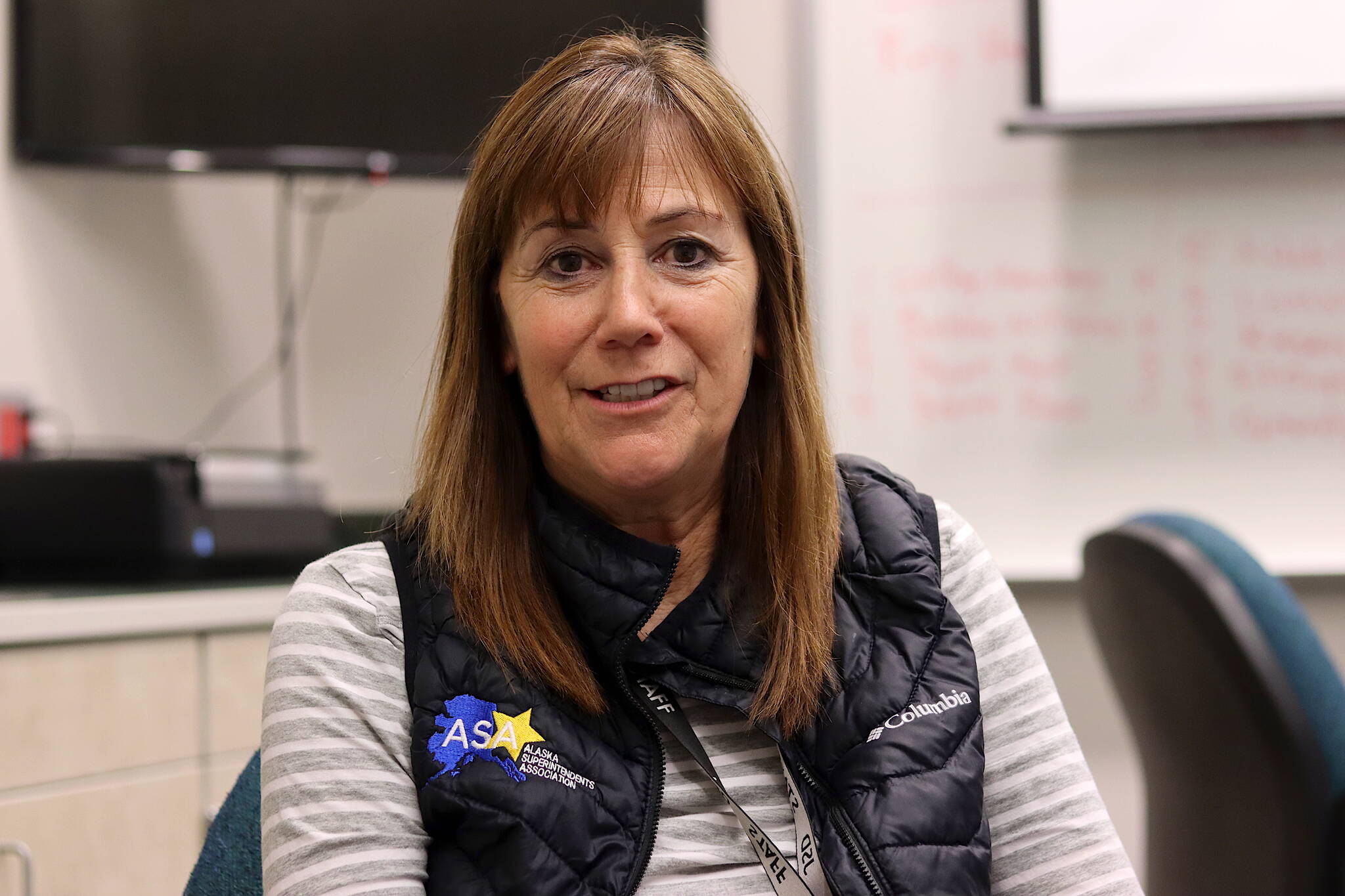 Bridget Weiss discusses her 39-year career in public education on Thursday, her second-to-last day as superintendent of the Juneau School District, in a break room at Thunder Mountain High School. (Mark Sabbatini / Juneau Empire)