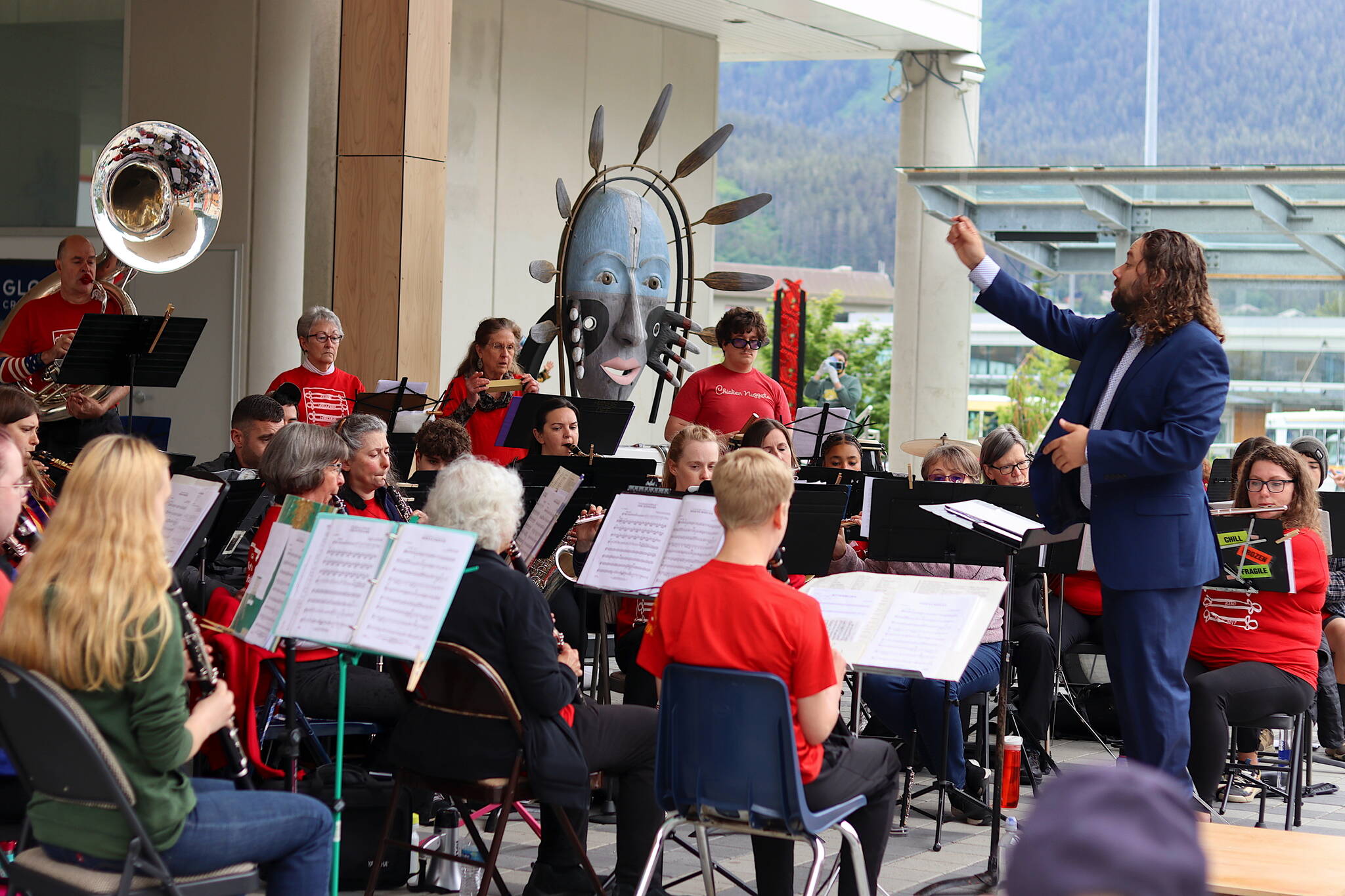 Mark Sabbatini / Juneau Empire
T.J. Hovest conducts the Juneau Volunteer Marching Band during an Independence Day weekend concert on Sunday at Sealaska Heritage Plaza.