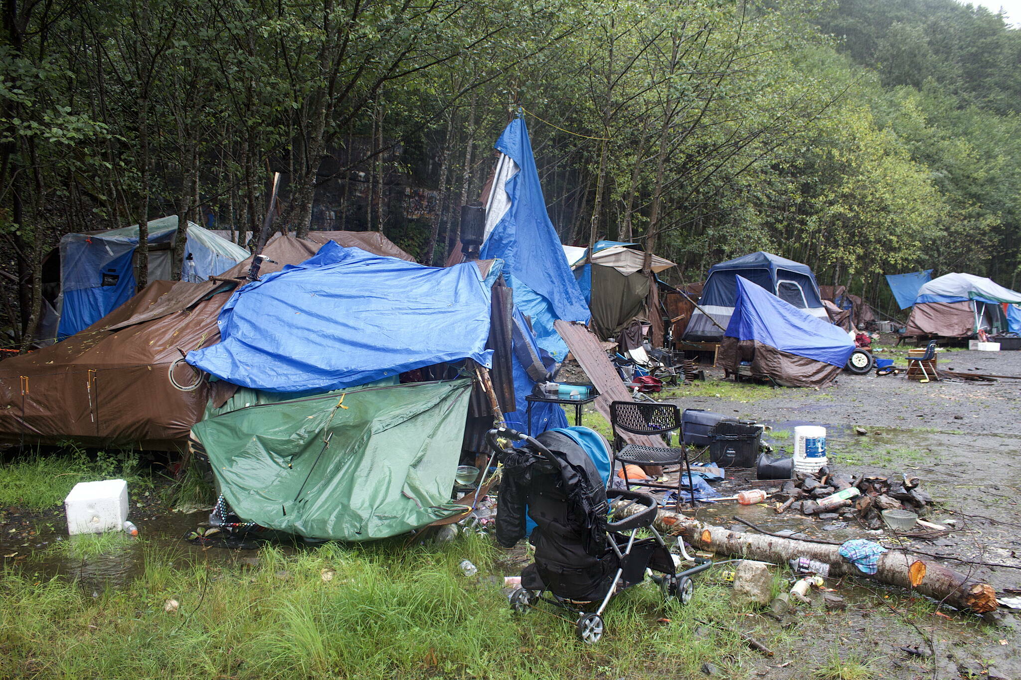 Tents and various items are scattered across the Mill Campground in August of 2022. (Mark Sabbatini / Juneau Empire File)