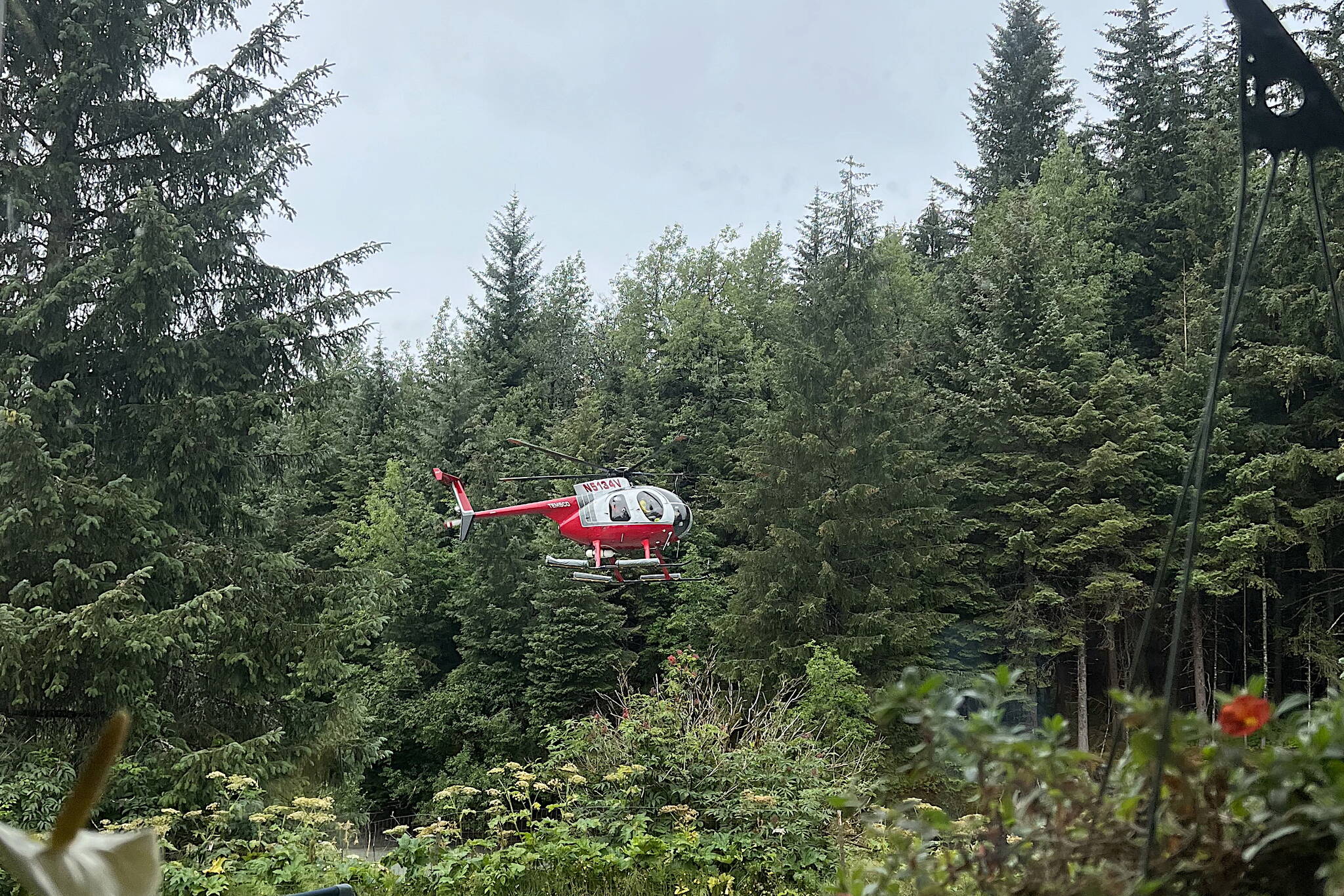 A Temsco Helicopters aircraft participates in a search along the Mendenhall River on Monday for a person reported missing since last Tuesday, who was last seen kayaking toward the Mendenhall Glacier. (Courtesy Photo/ Megan Rigas)