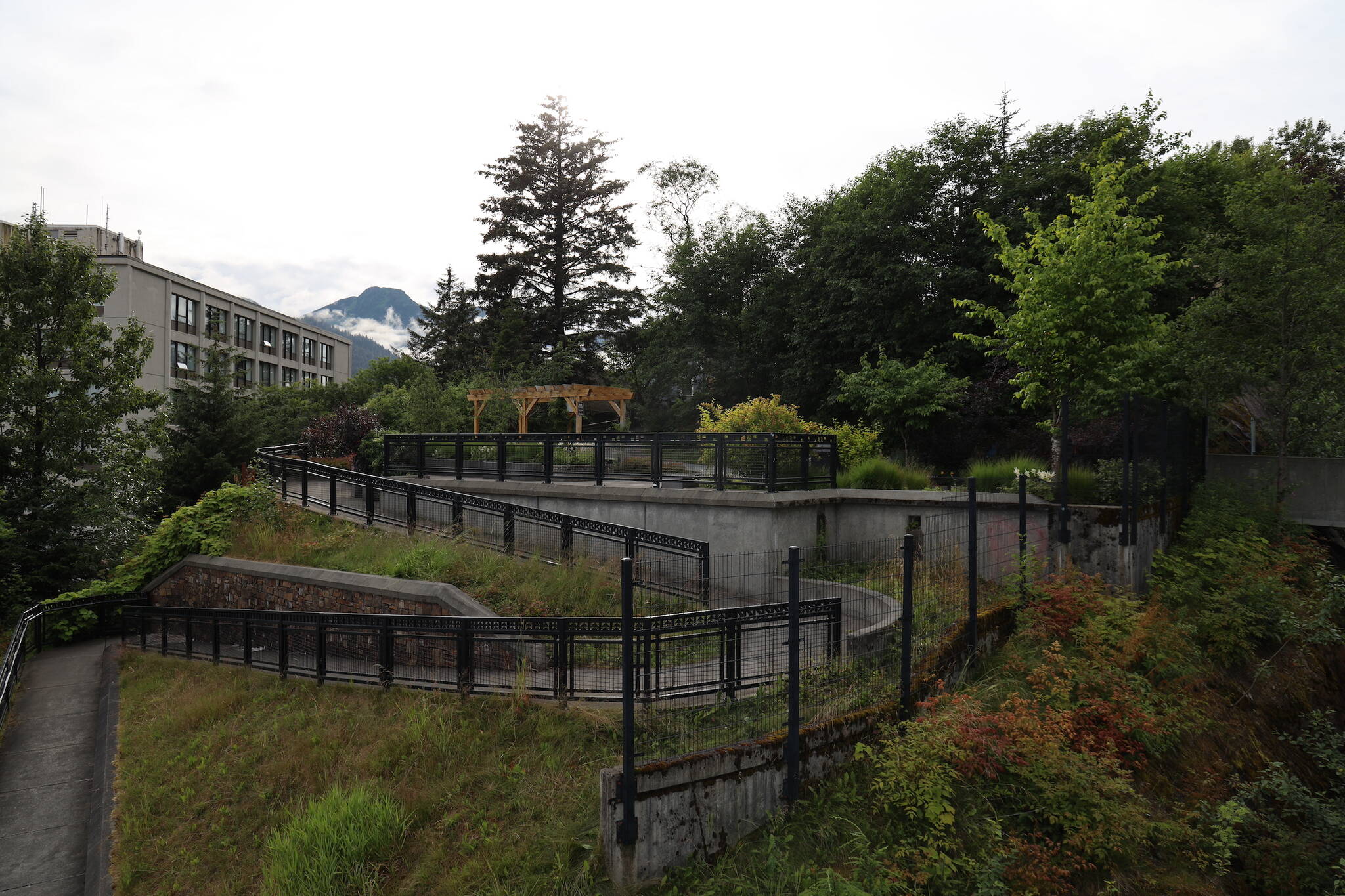 A switchback ramp leads up to Telephone Hill Park downtown Wednesday evening. (Clarise Larson / Juneau Empire)